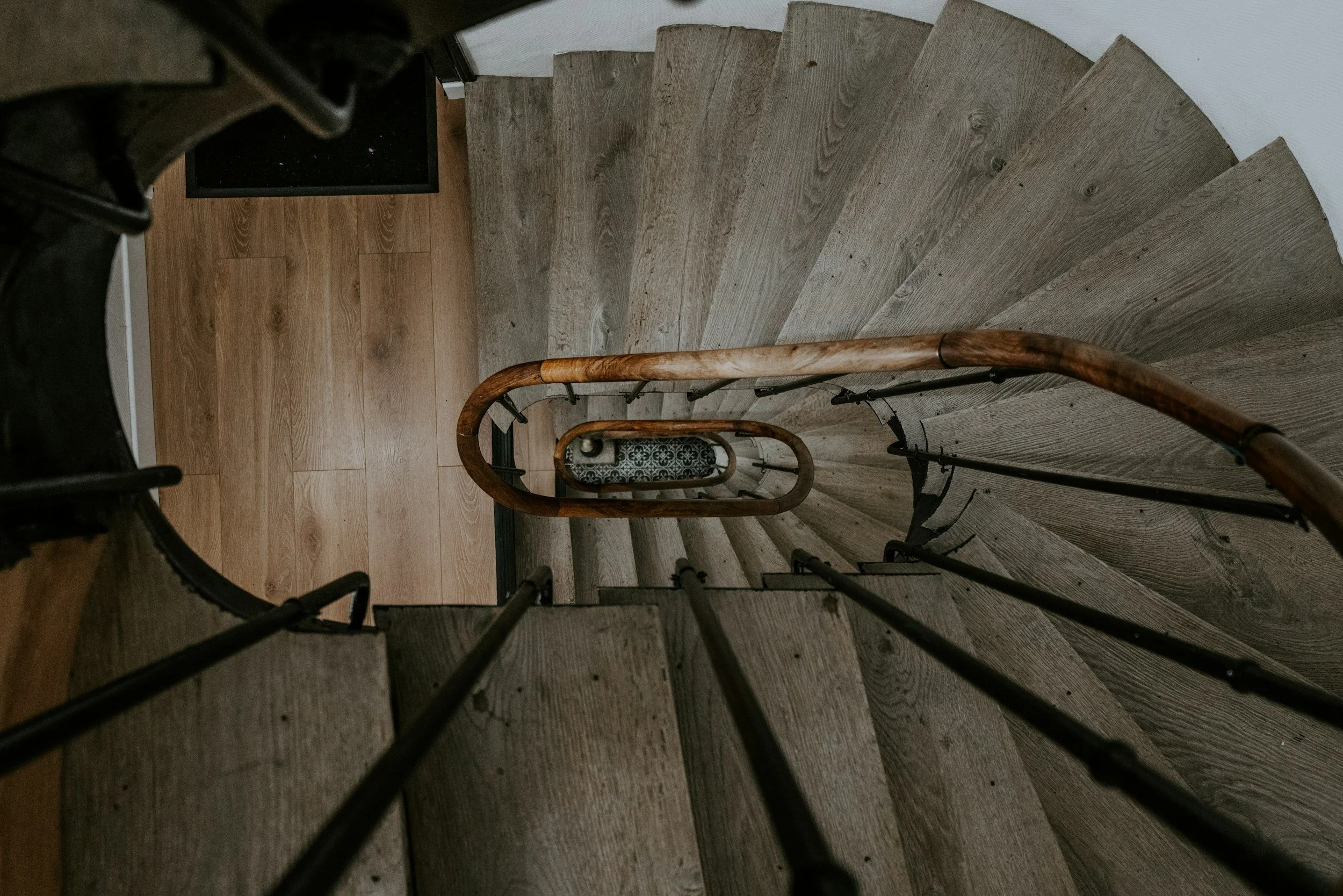 Detail of a luxury architectural staircase in a Kentucky home, curated by Avenue Real Estate Group.