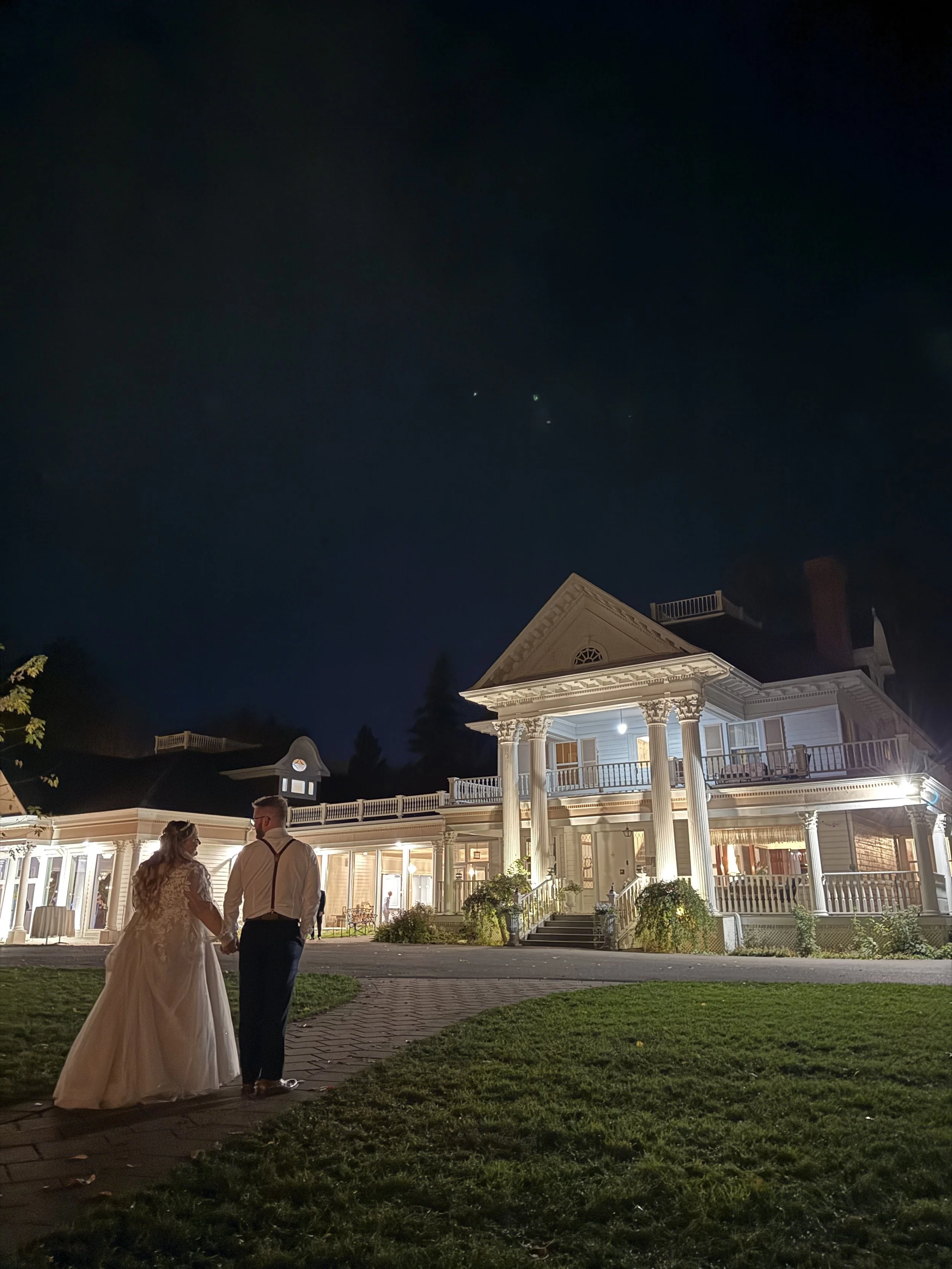 Standing In Front Of The Norland Historic Estate After The Reception 