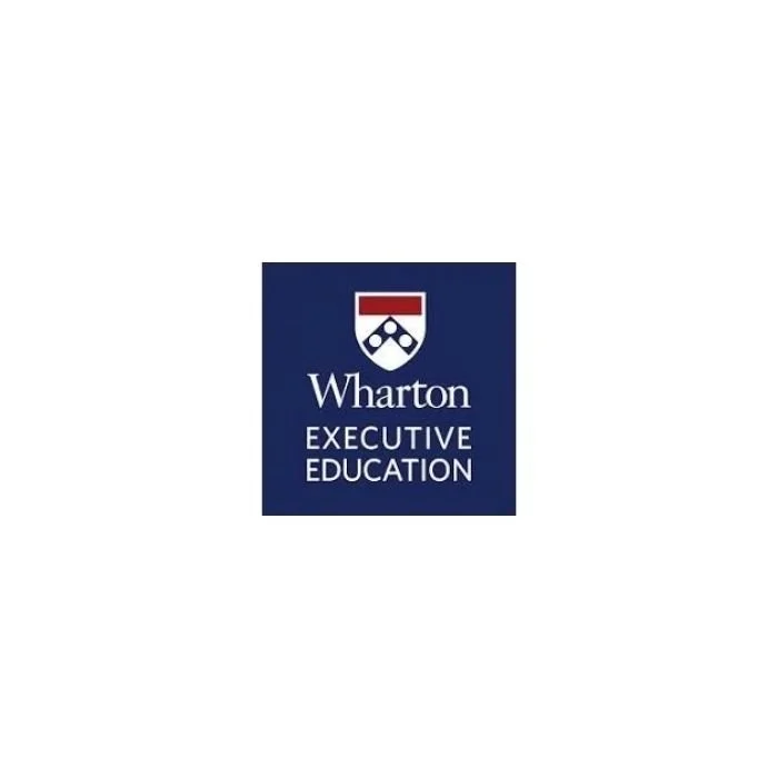 Logo for Wharton Executive Education, featuring a shield emblem with a red top and white middle with a stylized design, on a navy blue background.