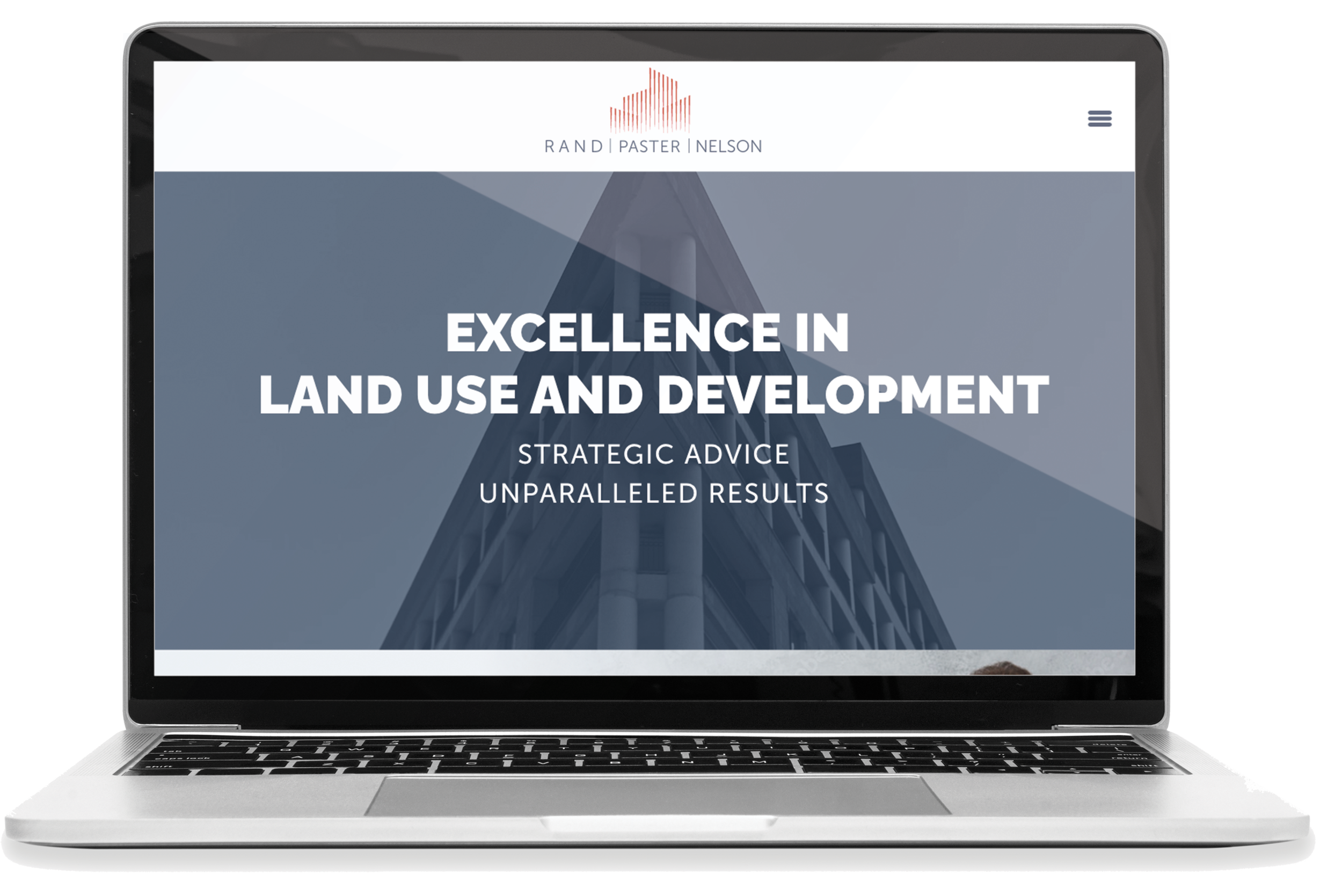 Laptop displaying a website with the text "Excellence in Land Use and Development" and the logo of Rand Paster Nelson at the top.