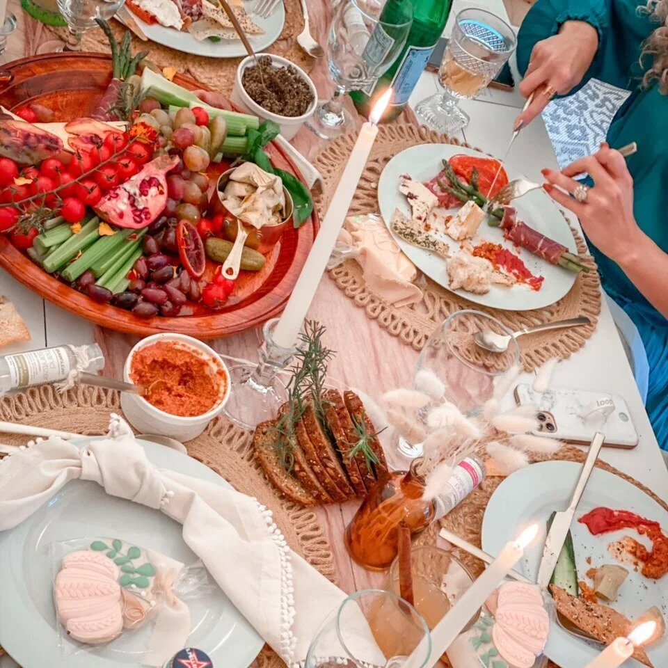 Guests dining from an Open Table spread