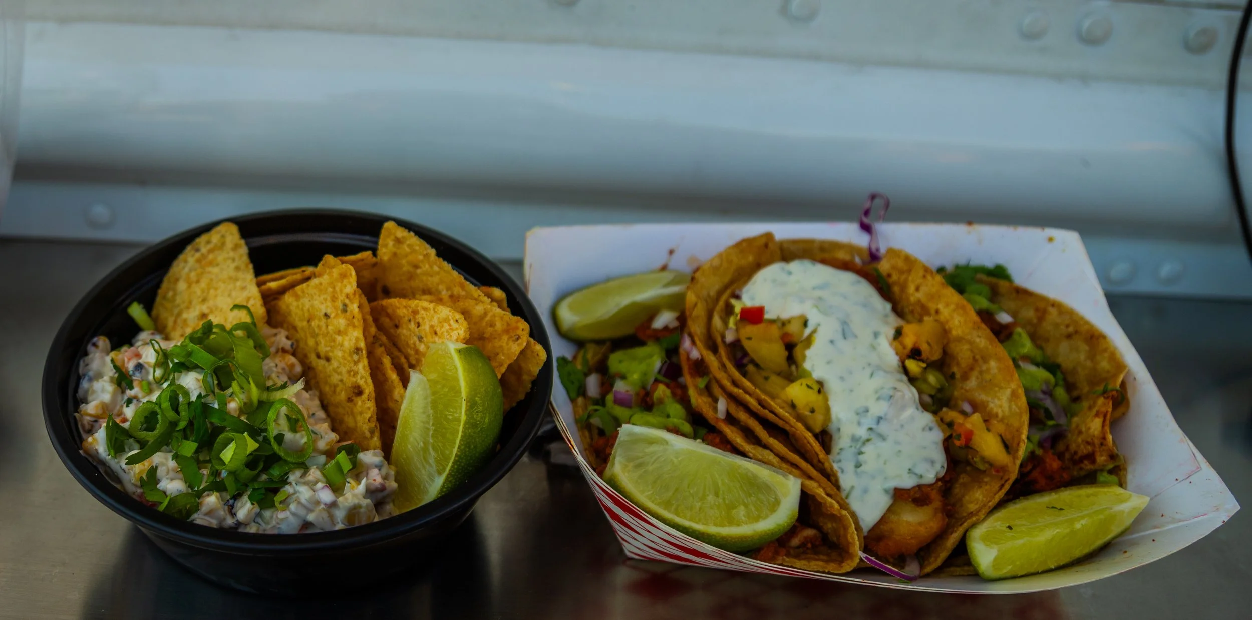 Fresh tacos and elote made by Lavender Haze Mobile