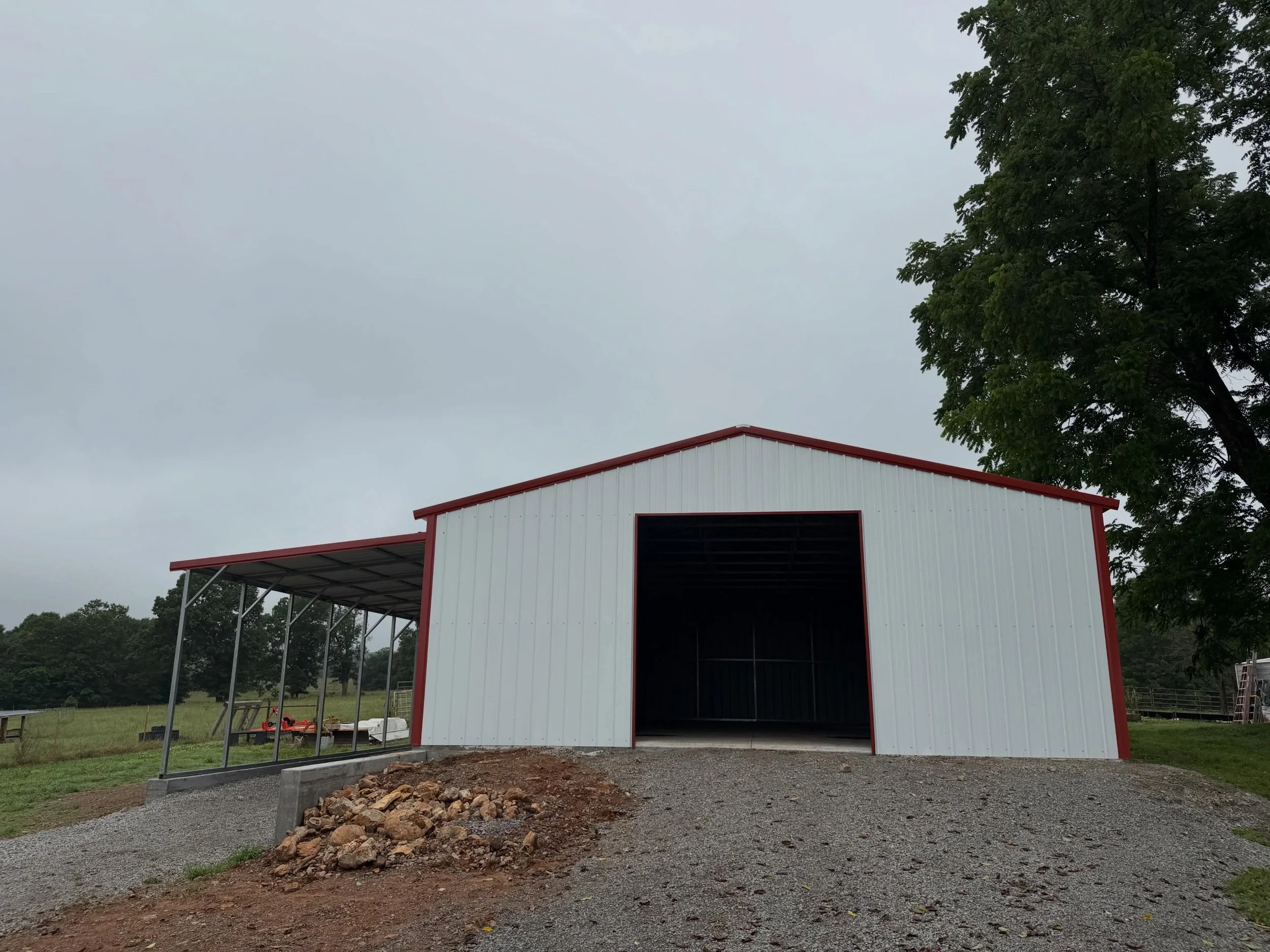 Check out this 30x40x12 steel building featuring a 12x40x12 lean-to, built for durability, functionality, and plenty of storage space.

✅ 30x40x12 Main Building
✅ 12x40x12 Lean-To
✅ 10x10 Garage Door Frame-Out
✅ Man Door Frame-Out
✅ Two Window Frame-