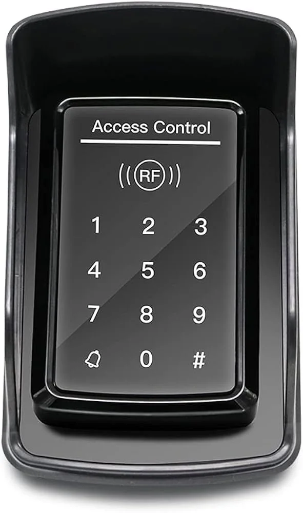 Touchscreen access control panel with numeric keypad, RF icon, and a bell icon, surrounded by a black and gray casing.