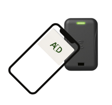 A smartphone displaying the text 'AD' on the screen and a portable electronic device with a green indicator light.
