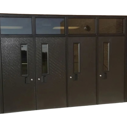 Black metal doors with vertical windows and small round handles.