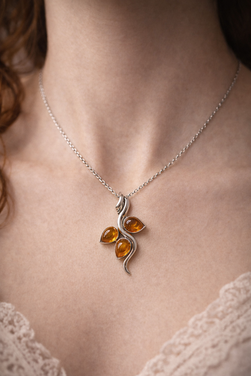 Baltic amber triple neck.png