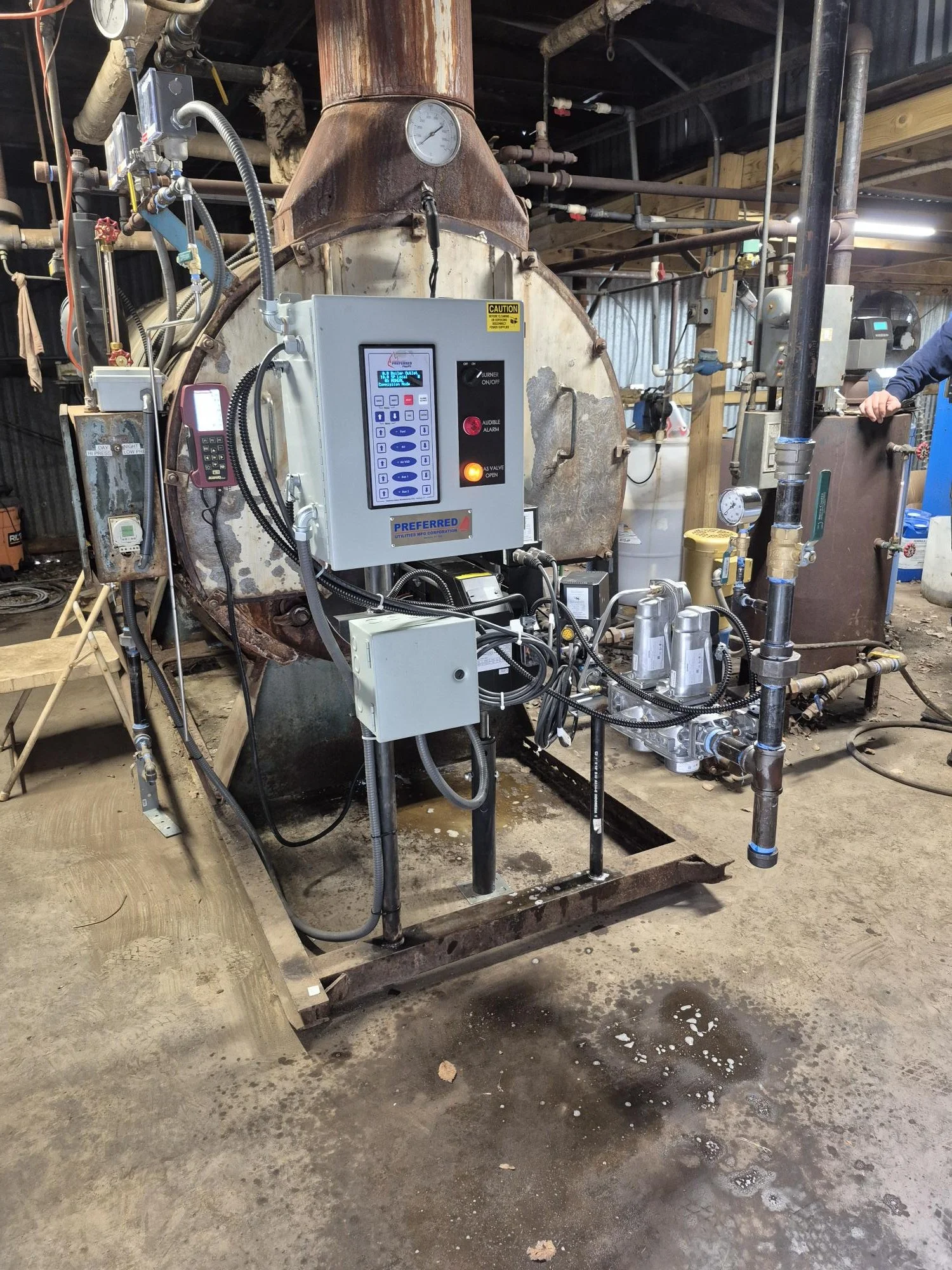 A new 50 HP Comet burner on an old Williams and Davis firetube boiler that is still going strong after 50 years of operation at a plating facility in Dallas. This full-modulation burner replaced an on-off burner that had served this boiler for over 4