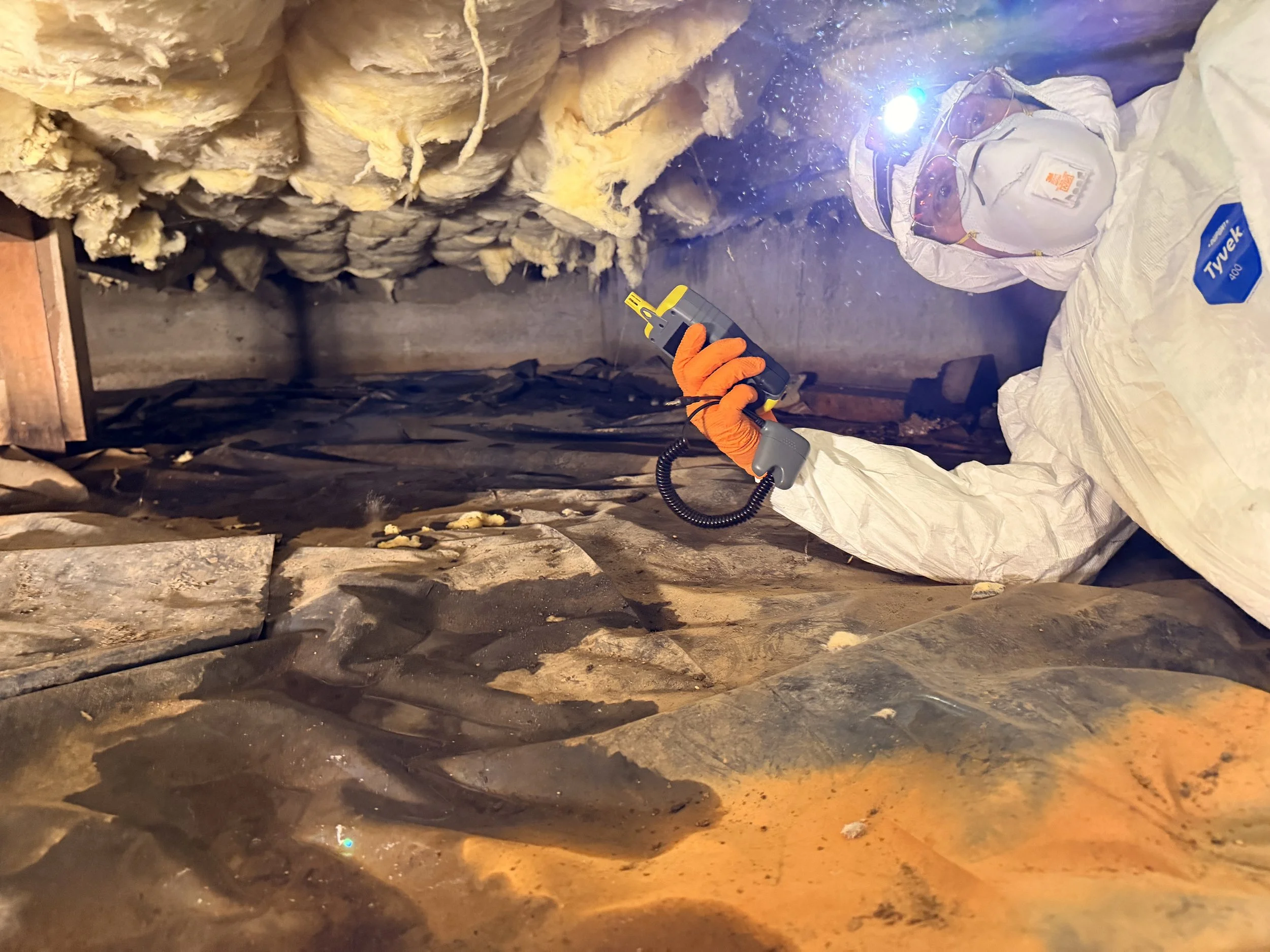 Crawl space inspection showing excessive moisture