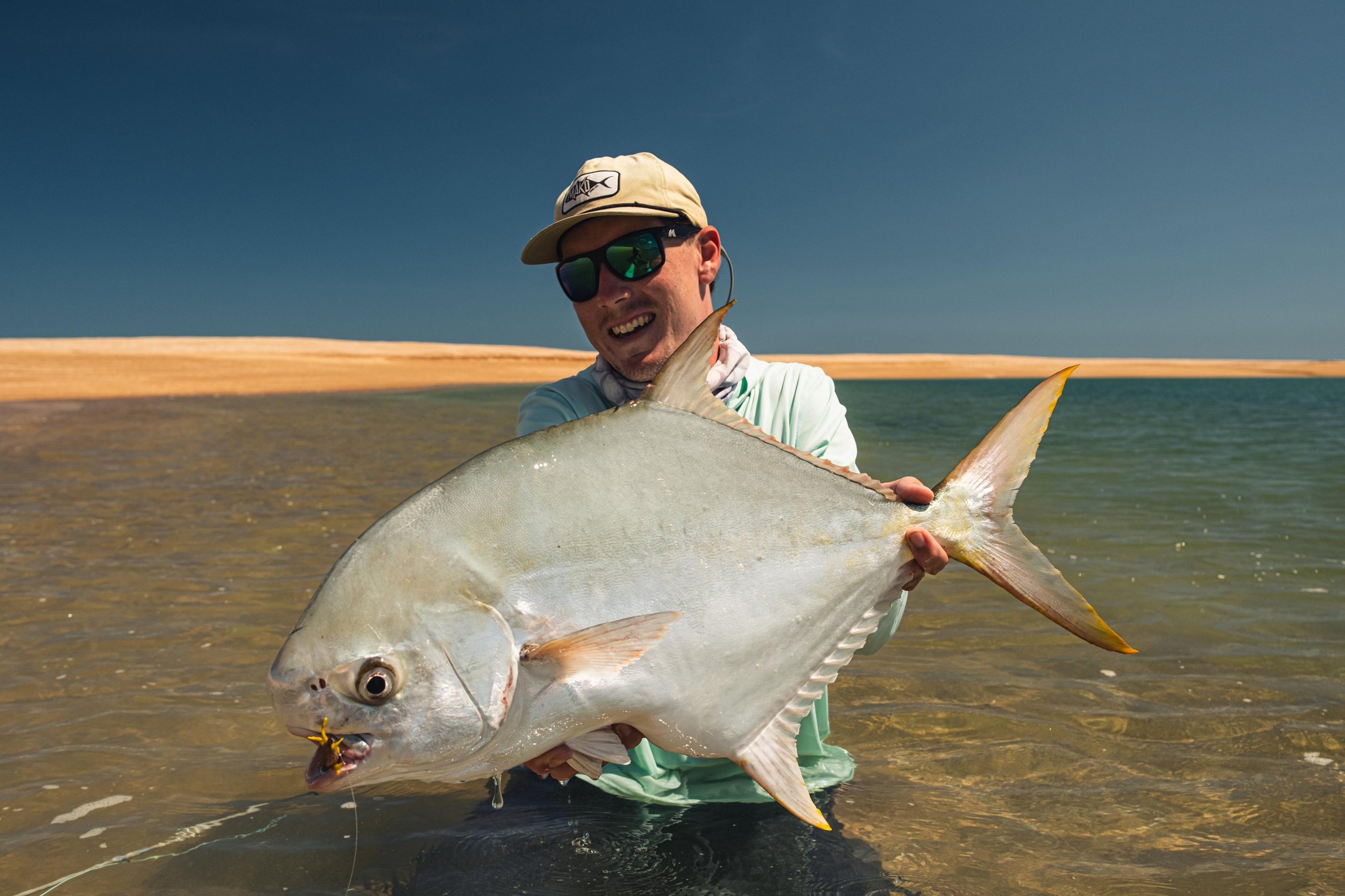 Flux fly fishing guide with a permit