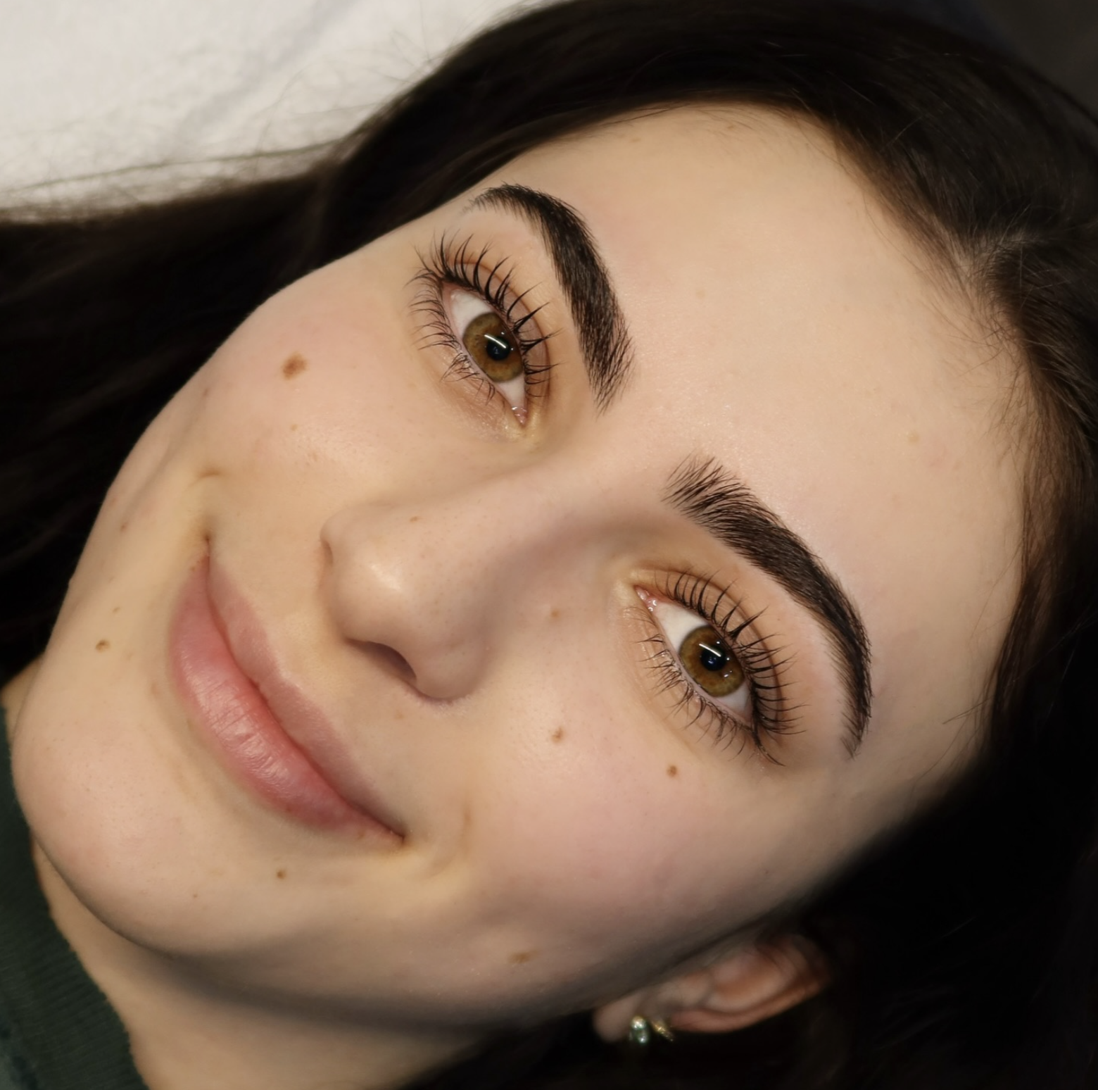 Woman having Eyebrow shaping and tinting in Chandler, AZ