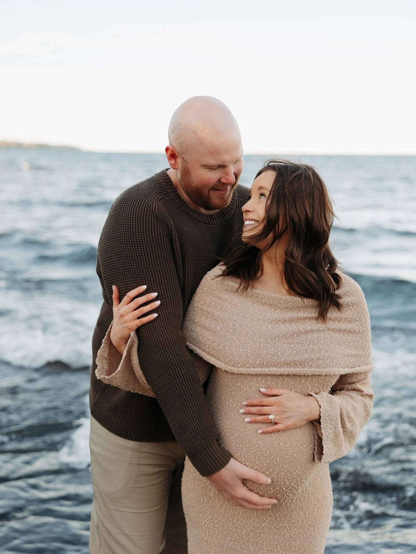 golden skies, perfect water, and hearts full of happiness ✨ excited to meet their little one earth side 🤍