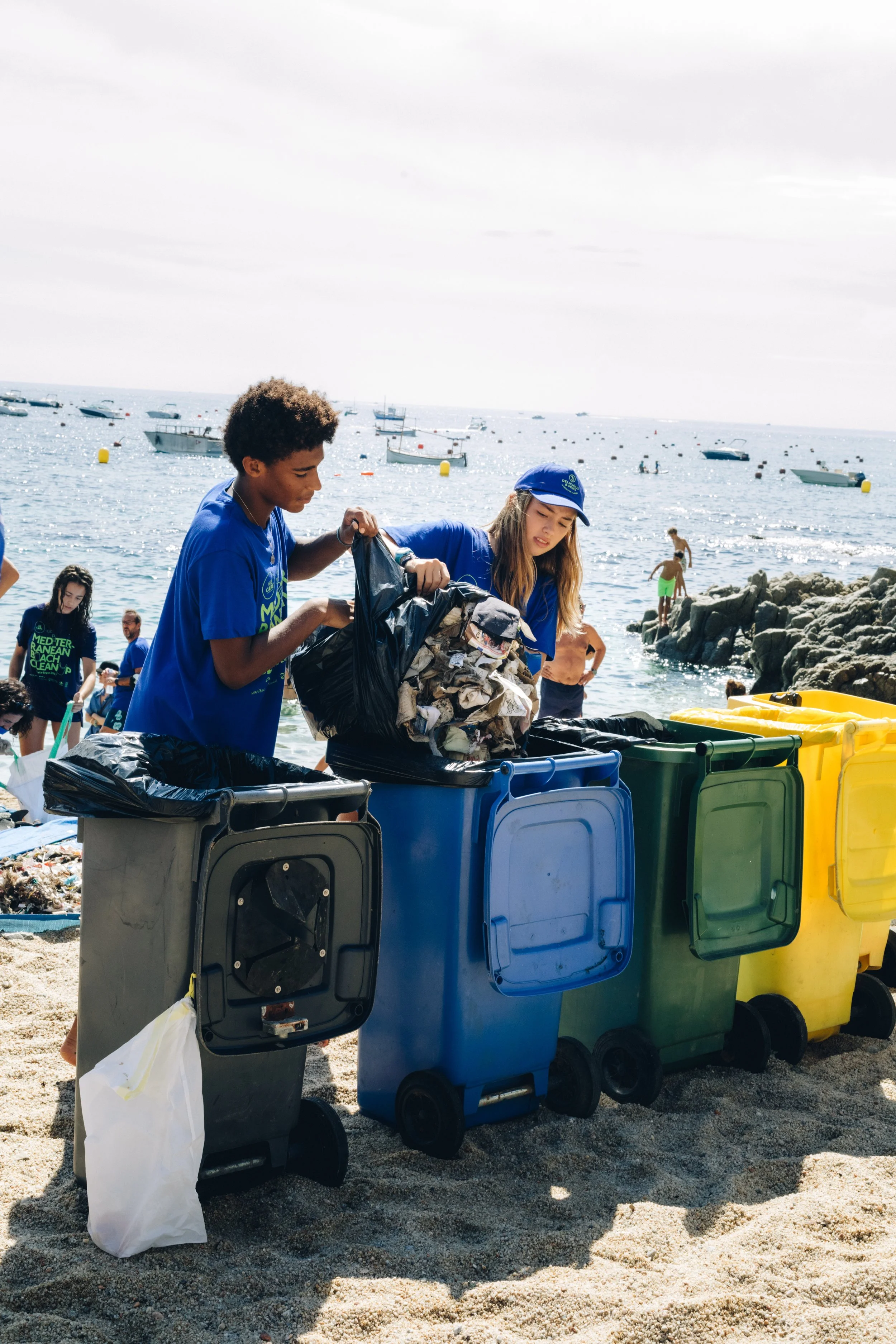 Environmental youth activist Olivia Mandle leading a beach cleanup in the Mediterranean.