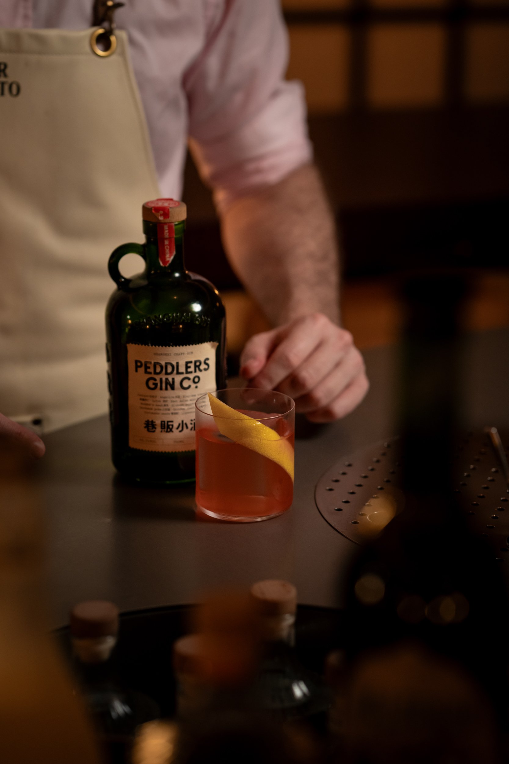 Counter-style cocktail experience at Bar S-OTTO, recommended by Peddlers Gin in Shanghai.