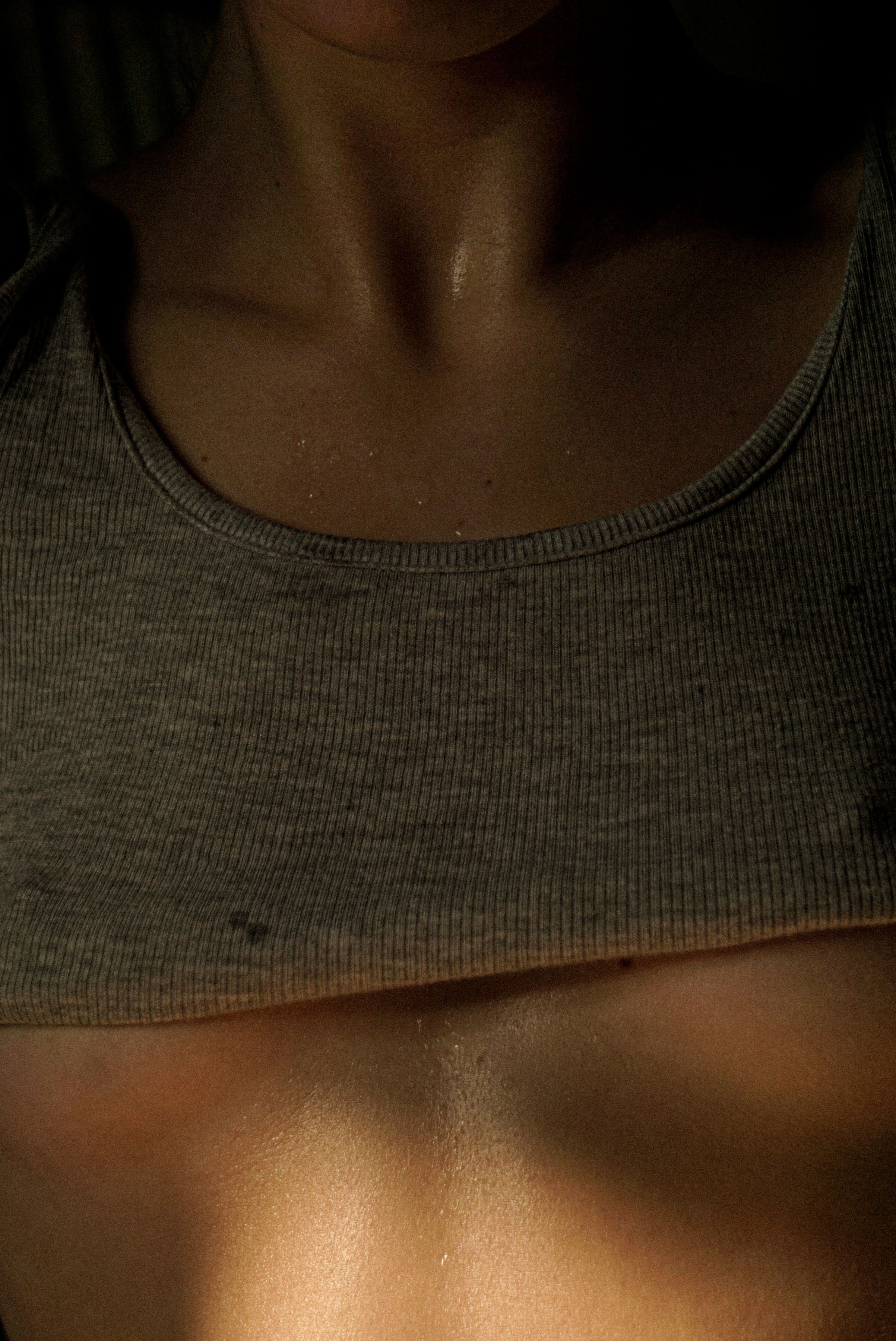 close up of a woman in workout clothing