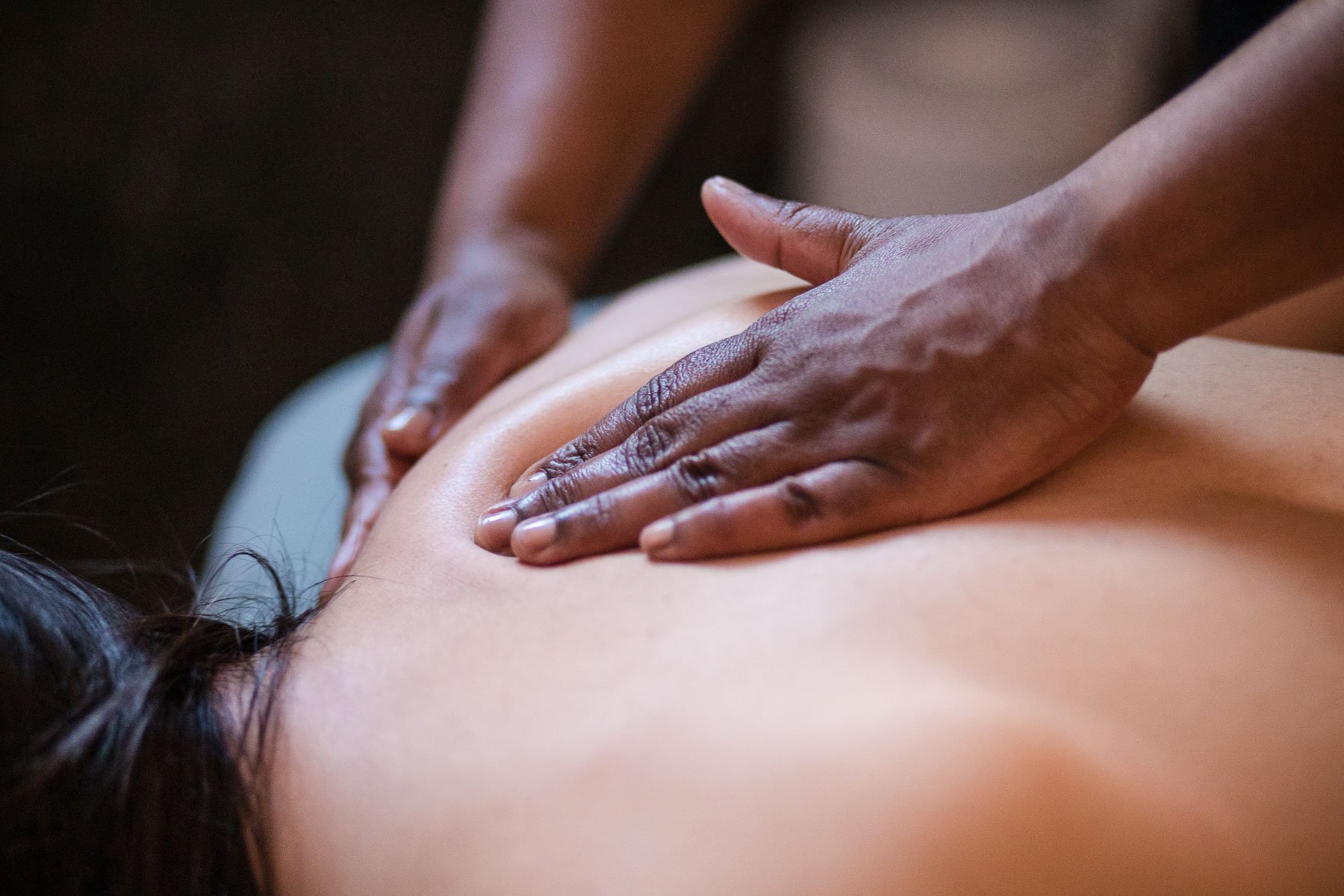 Person receiving a massage on their back