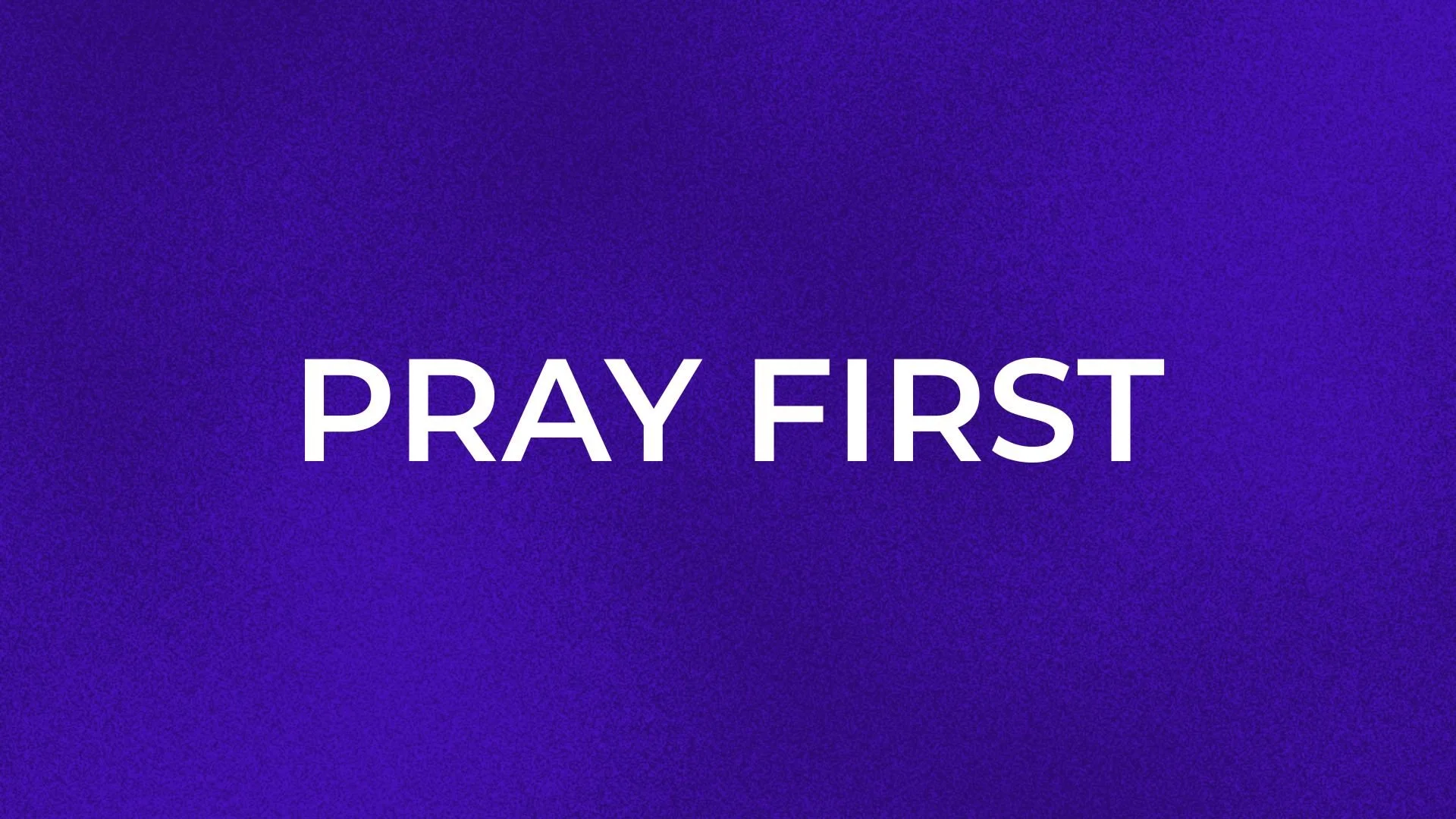 A blue background with the words "PRAY FIRST" written in white capital letters.