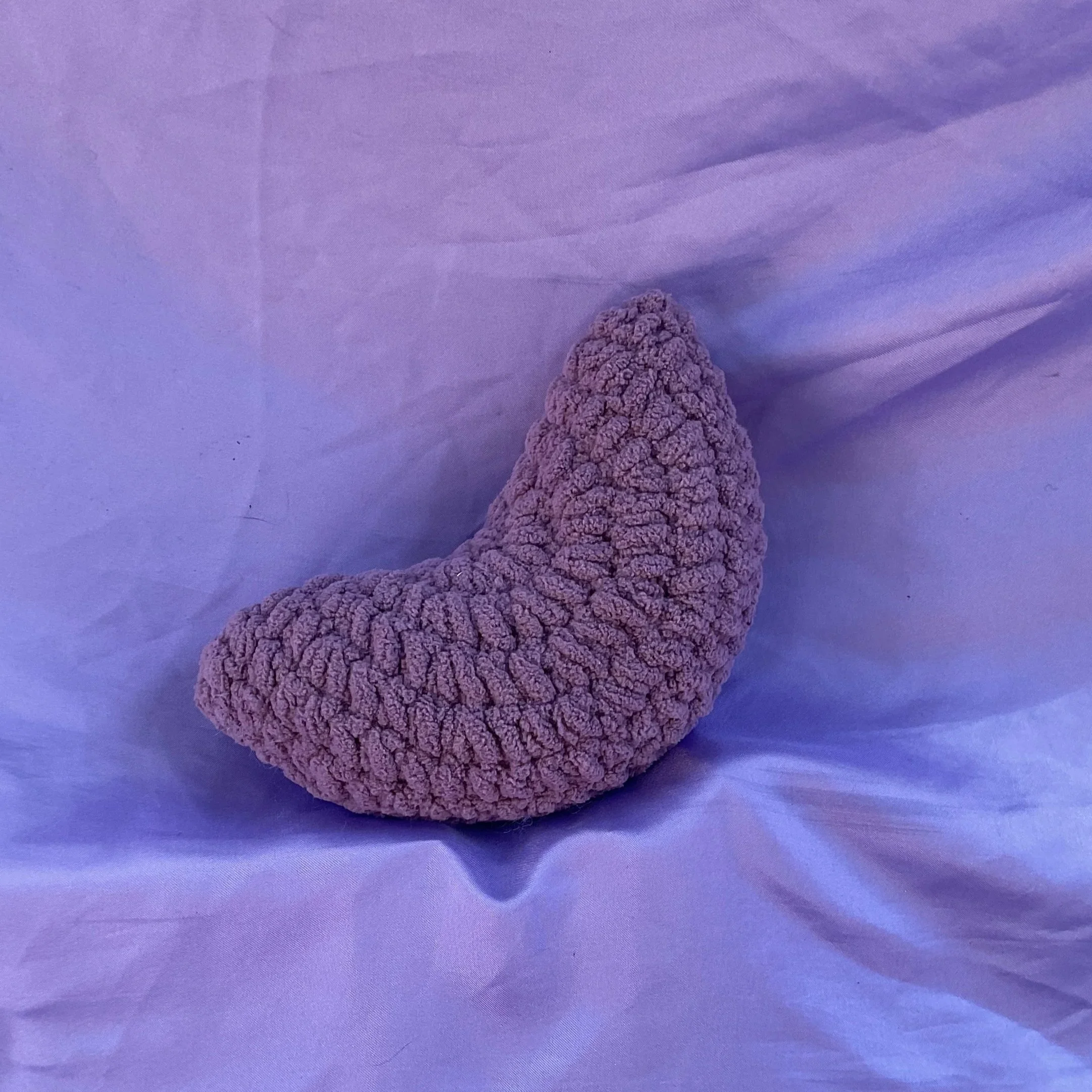 small purple crochet moon