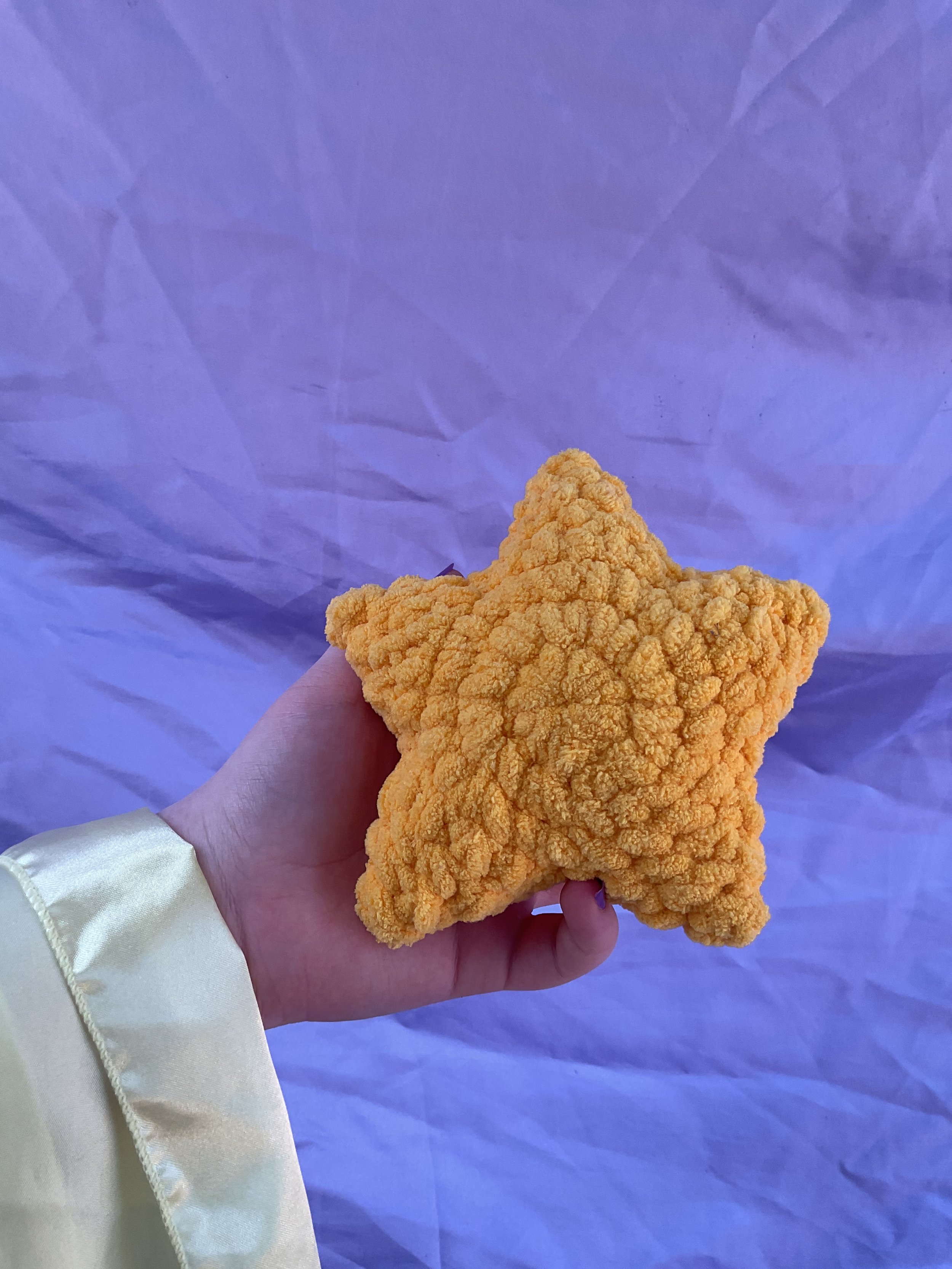 small yellow crochet star