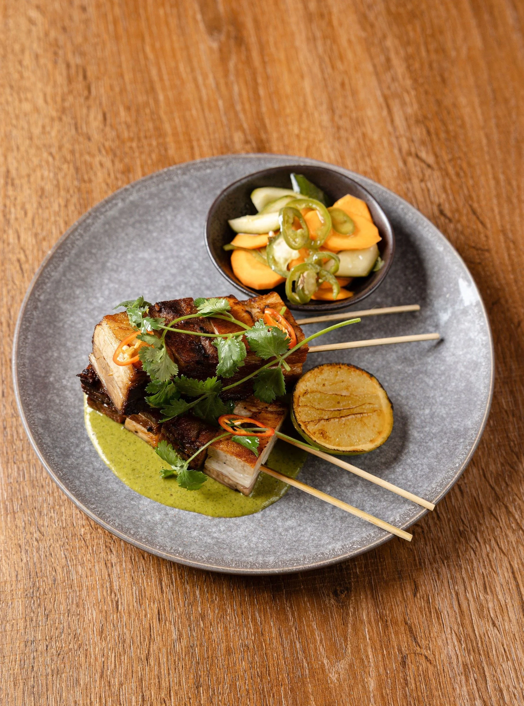 Charred Pork Belly with Pickles and Salsa. 

Smoky, Rich, and delicious. 

89 Prospect Road, Prospect

Bookings via the link in bio.