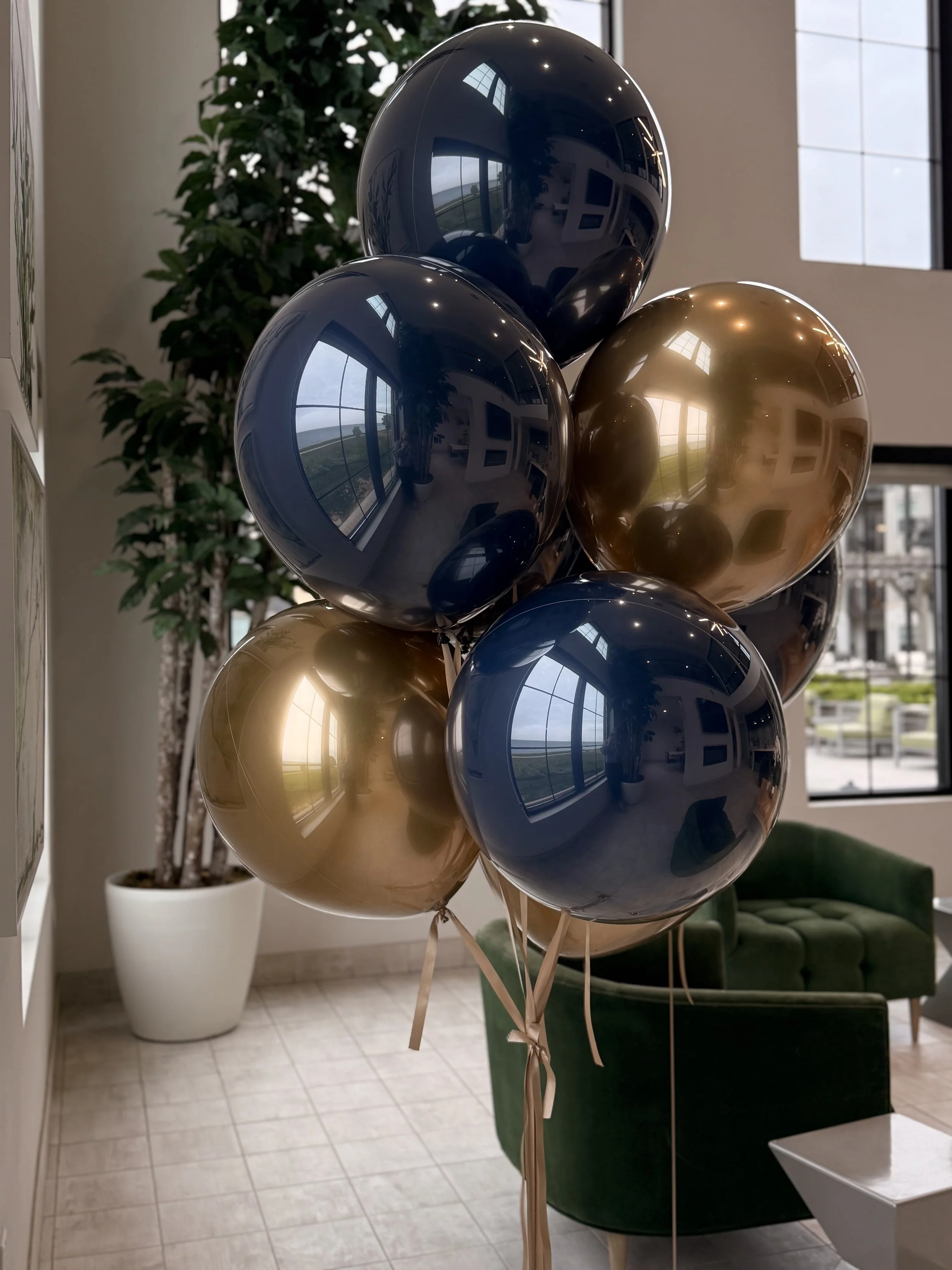 Luxury midnight blue and gold double-stuffed birthday balloon bouquet with oversized 18-inch helium balloons and custom 24-inch balloon with text by House of Balloons Milwaukee