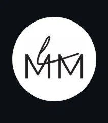 Logo with stylized letters 'L' and 'M' inside a white circle on a black background for "Little Modern Market".