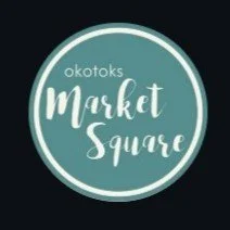 Logo for Okotok's Market Square with teal background and white text