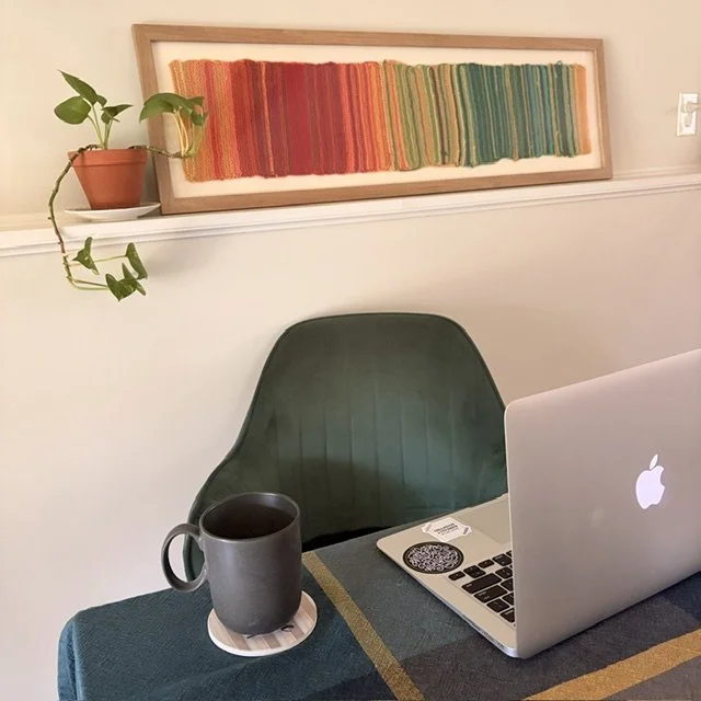 Therapy Office for Virtual EMDR Sessions with colorful art and laptop