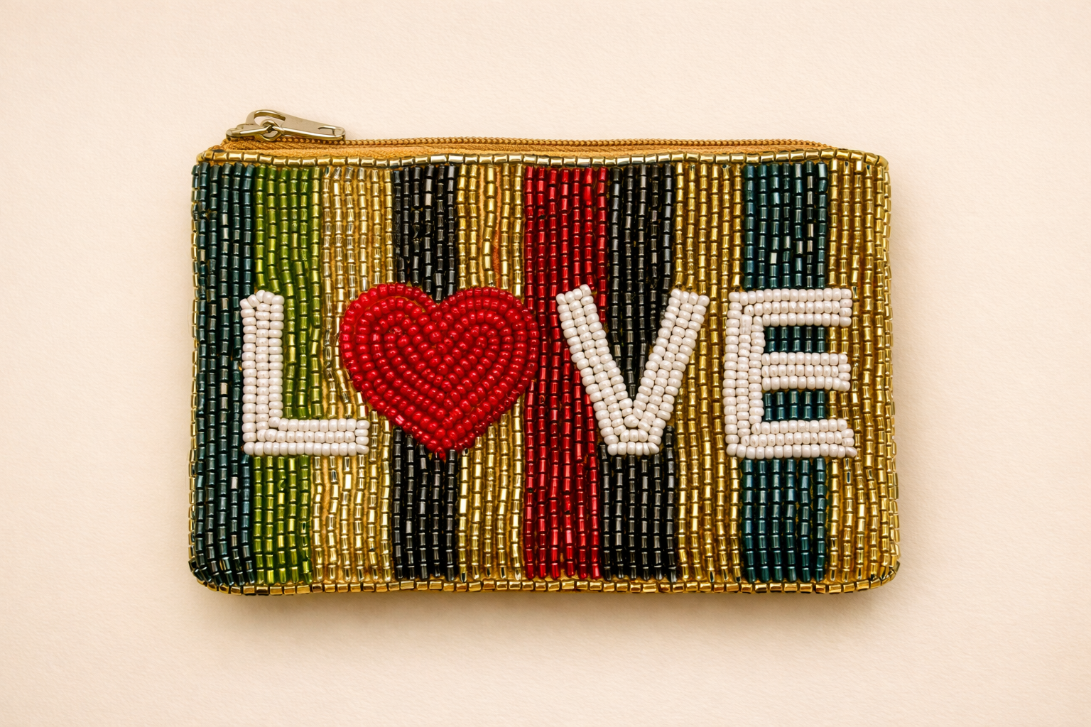 Beaded purse with the word 'LOVE' and a heart symbol, colorful striped pattern.