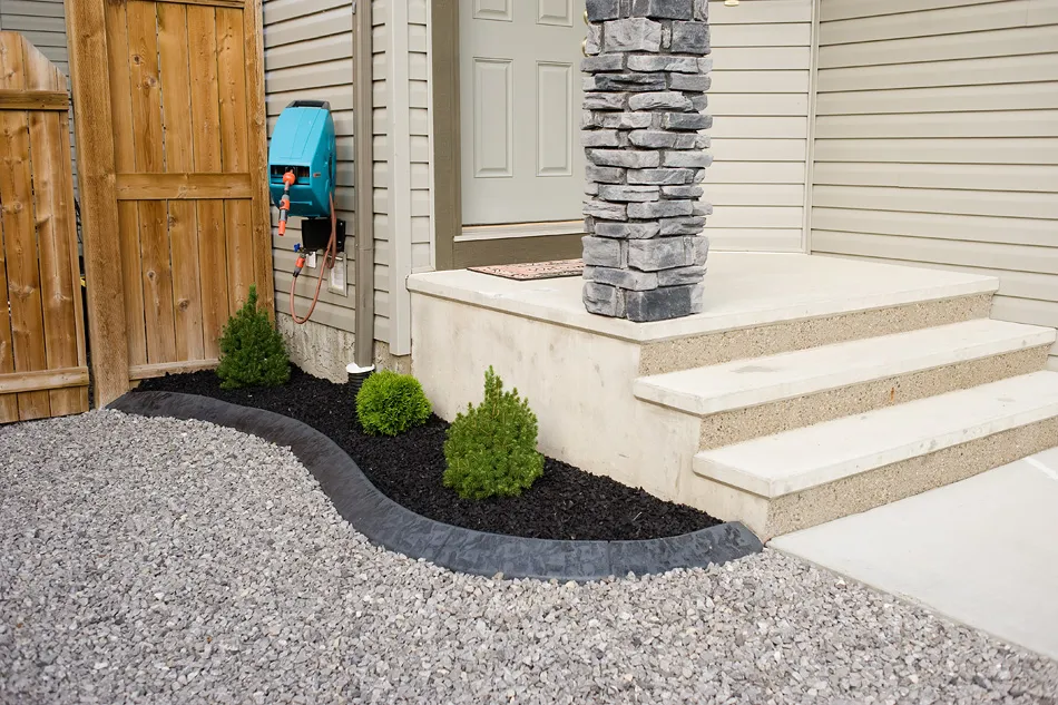 Decorative curbing creating tidy garden edges
