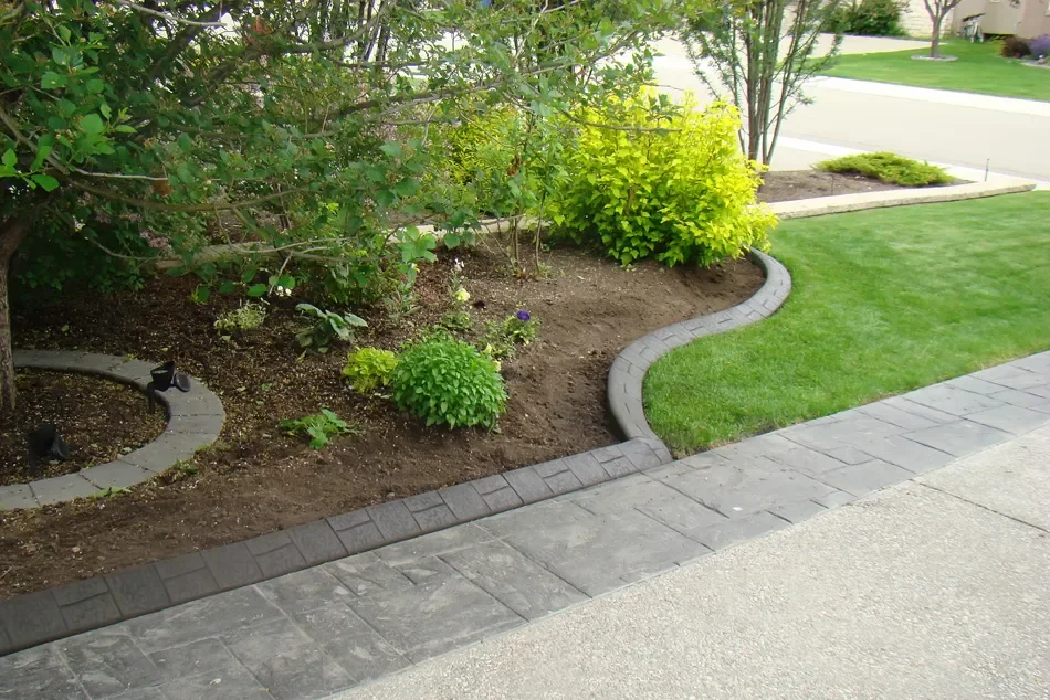 Decorative landscape curbing with h-brick stamped pattern