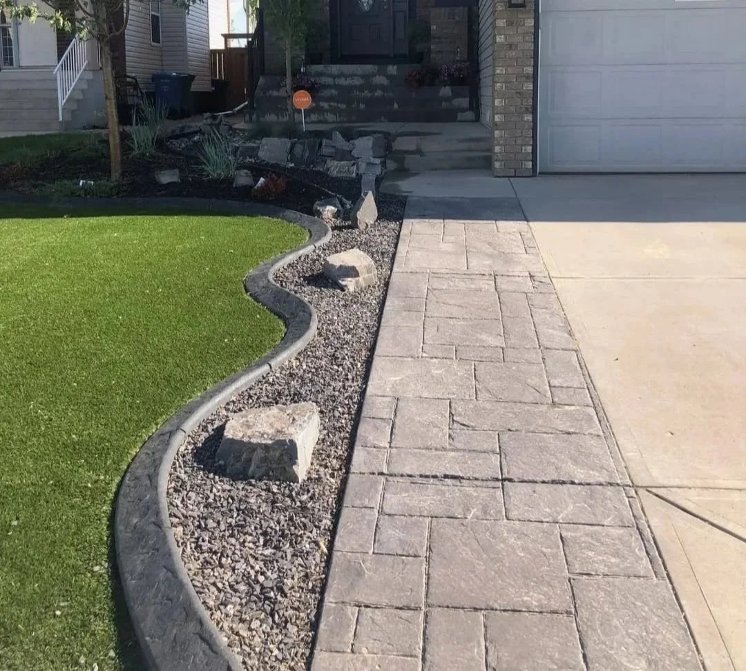 Decorative curbing creating tidy garden edges
