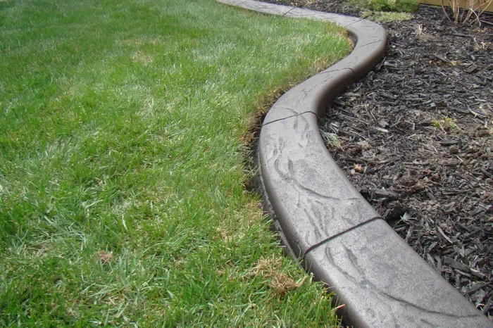 Decorative landscape curbing installed in Chestermere yard
