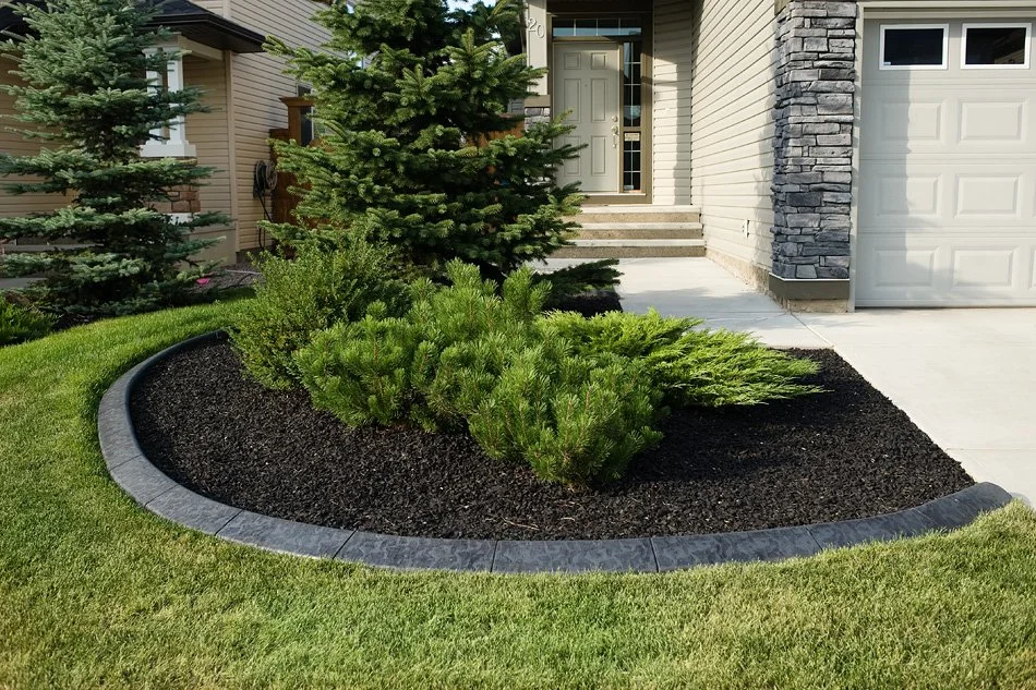 Residential concrete curbing by Creative Edge in High River with durable finish
