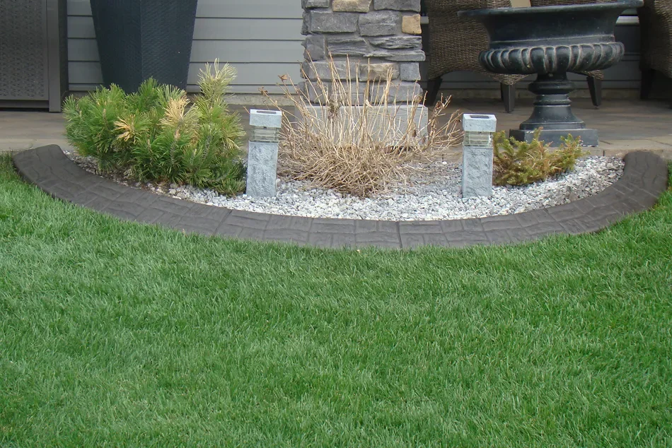 Decorative concrete borders around patio area