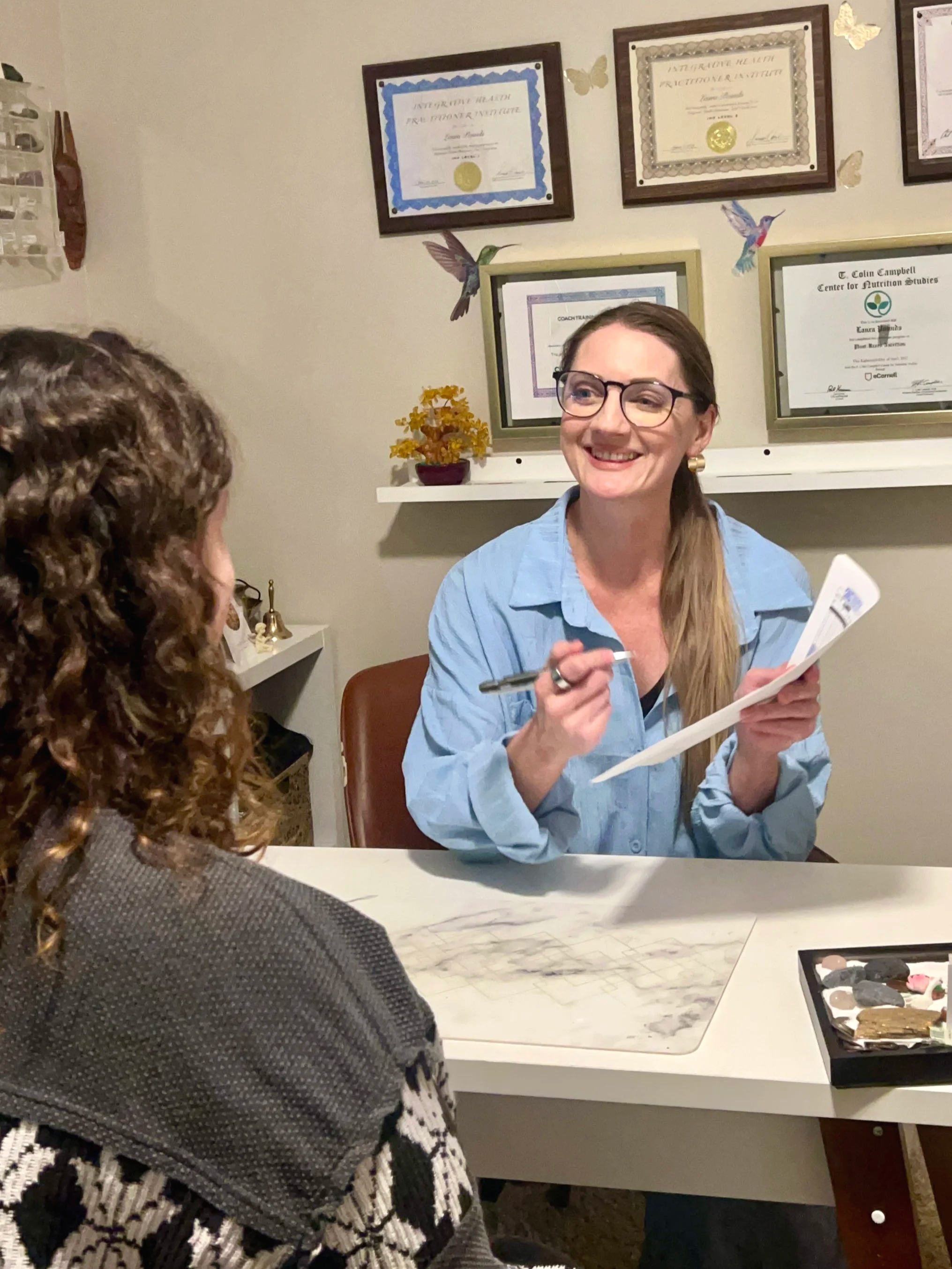 Health practitioner reviewing labs with patient