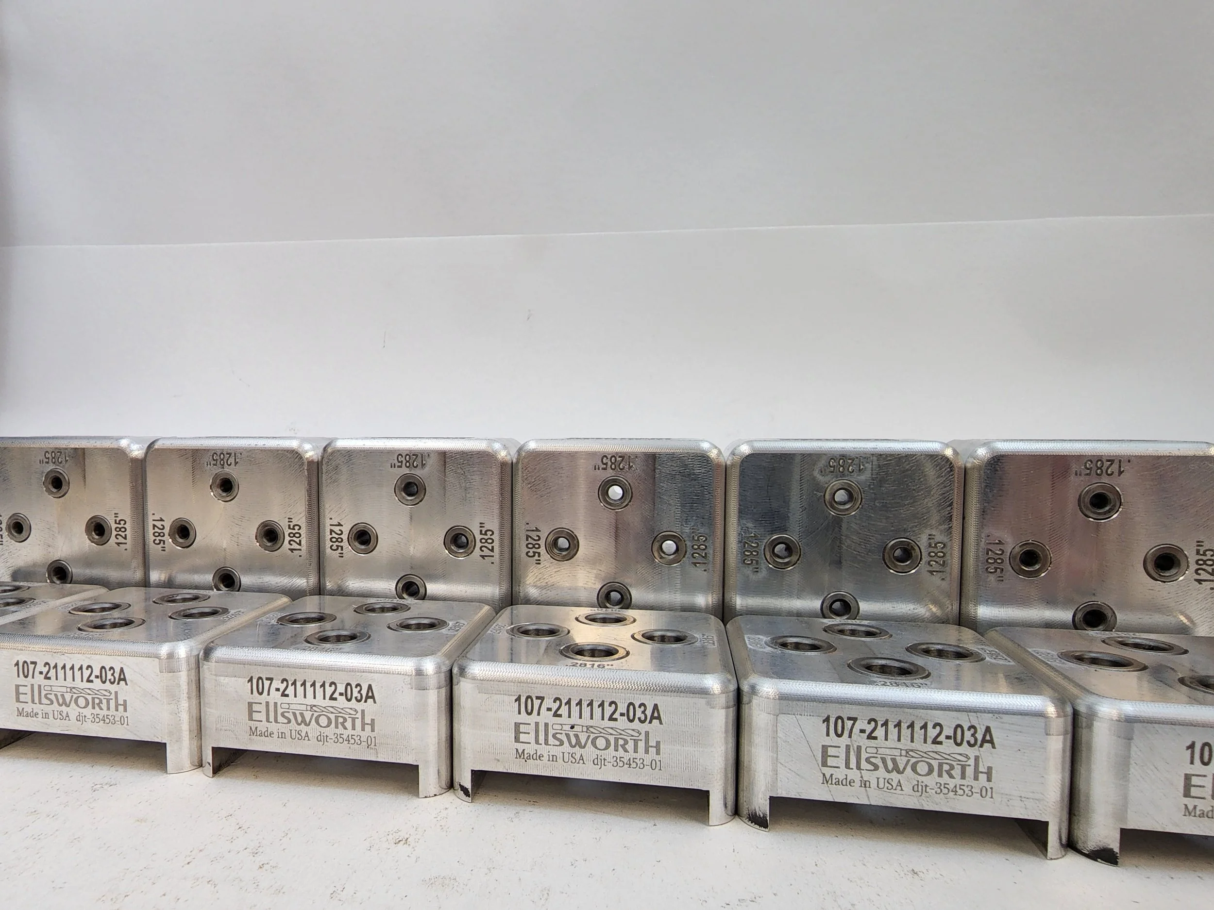 Custom CNC drill fixture with hardened drill bushings for high-volume precision hole location