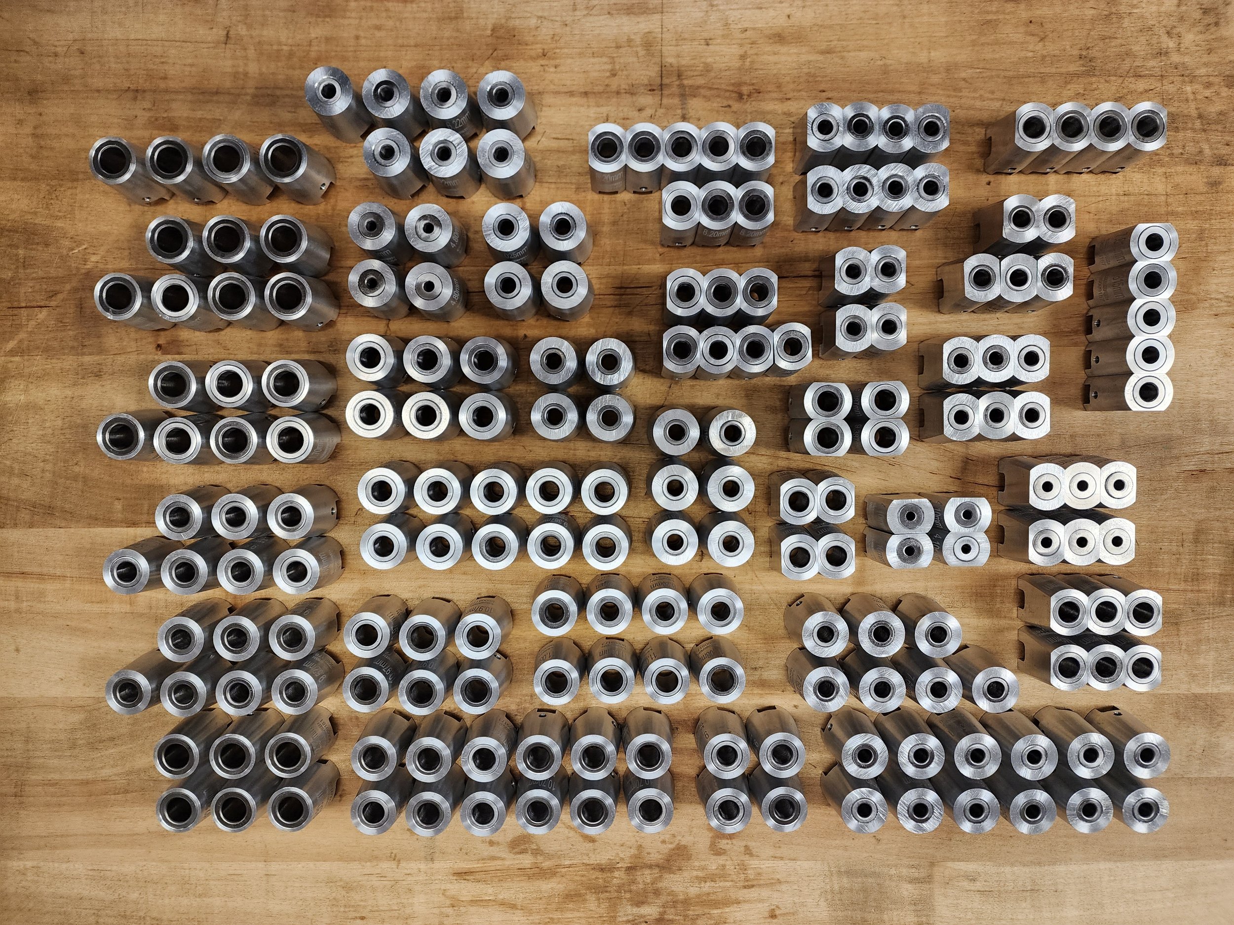 Large set of hardened drill bushings for precision jig and fixture applications