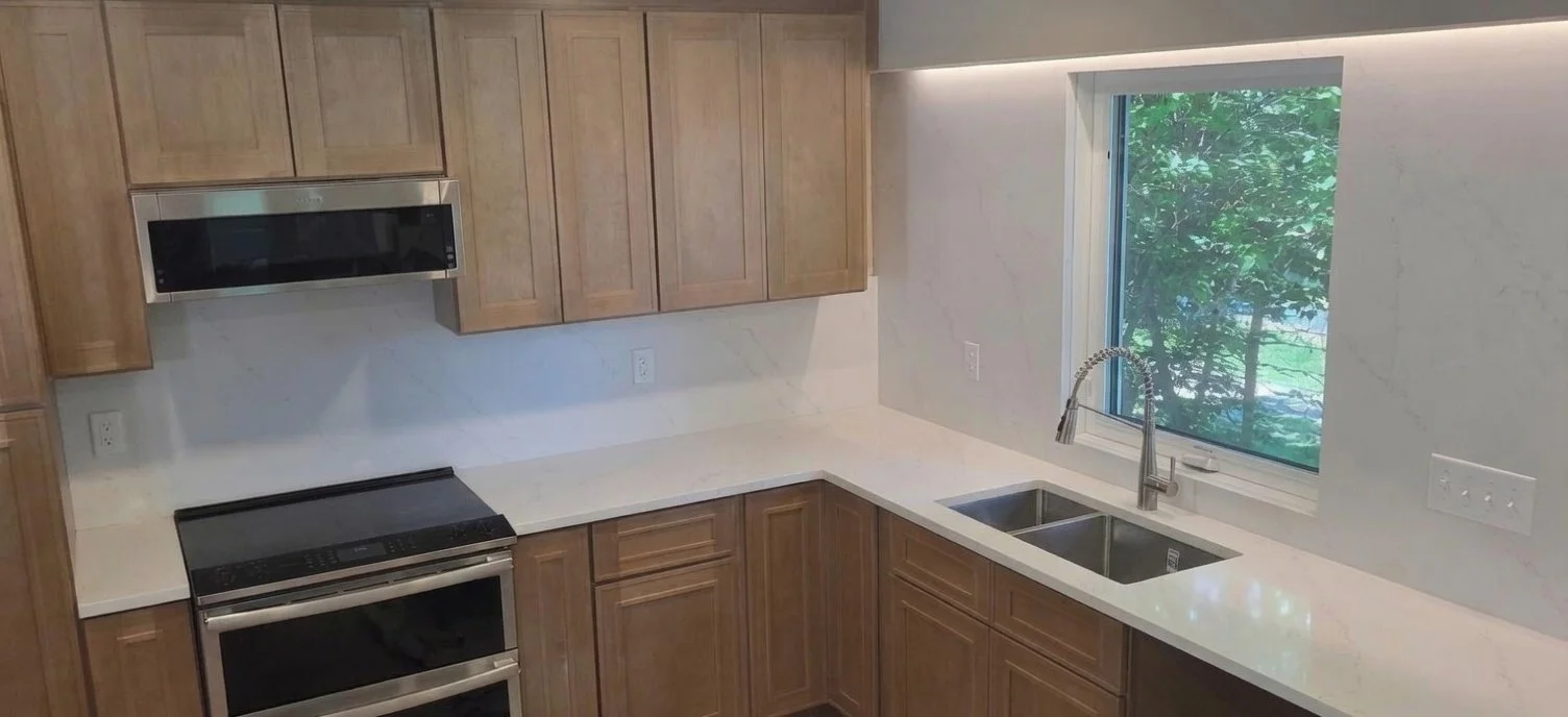 Whisper Gold Primus Surfaces Full height backsplash Top Stone