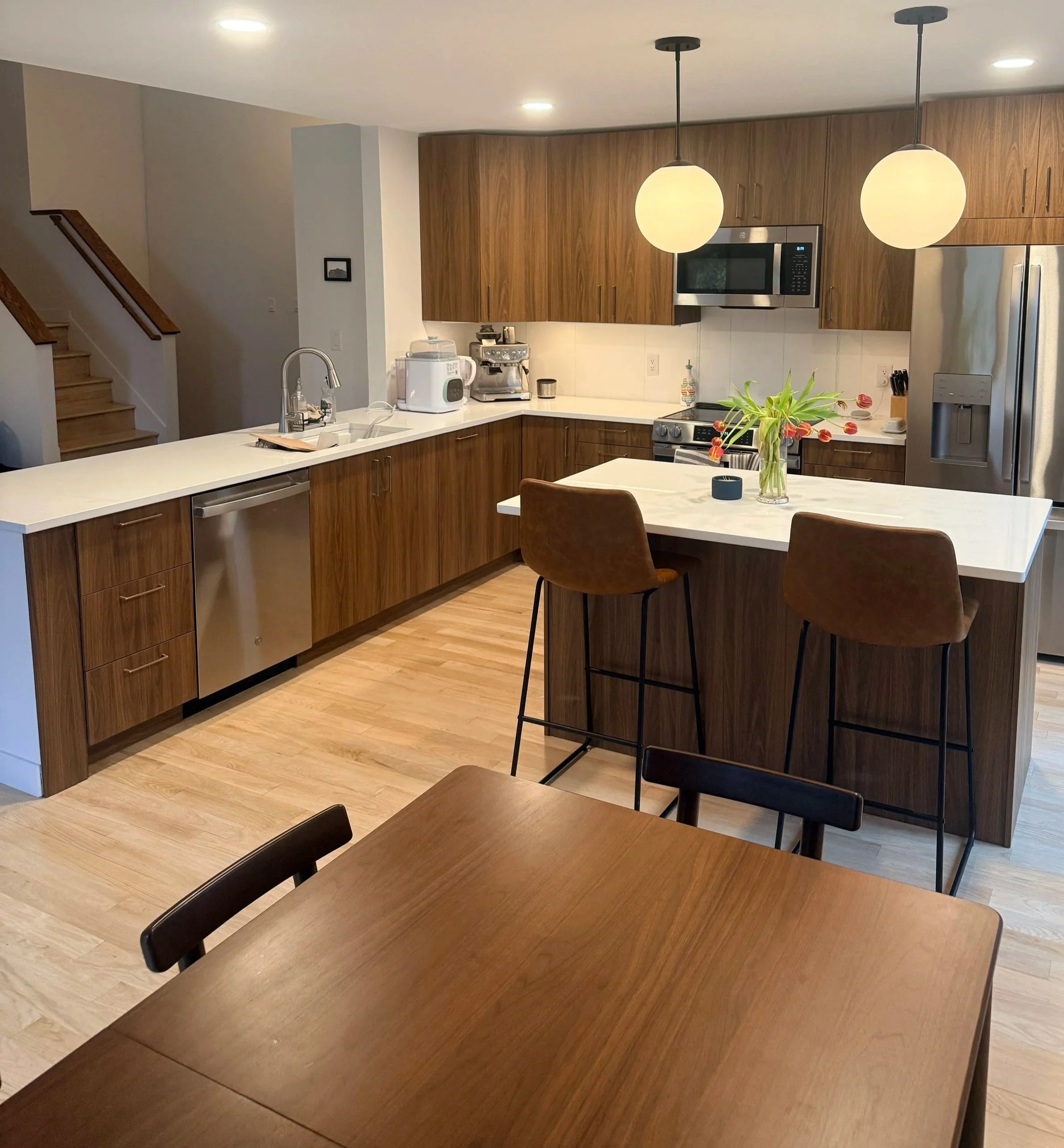 Modern kitchen renovation with brand new Maple White quartz countertops. Stone fabrication, delivery, and install 5-7 day turnaround