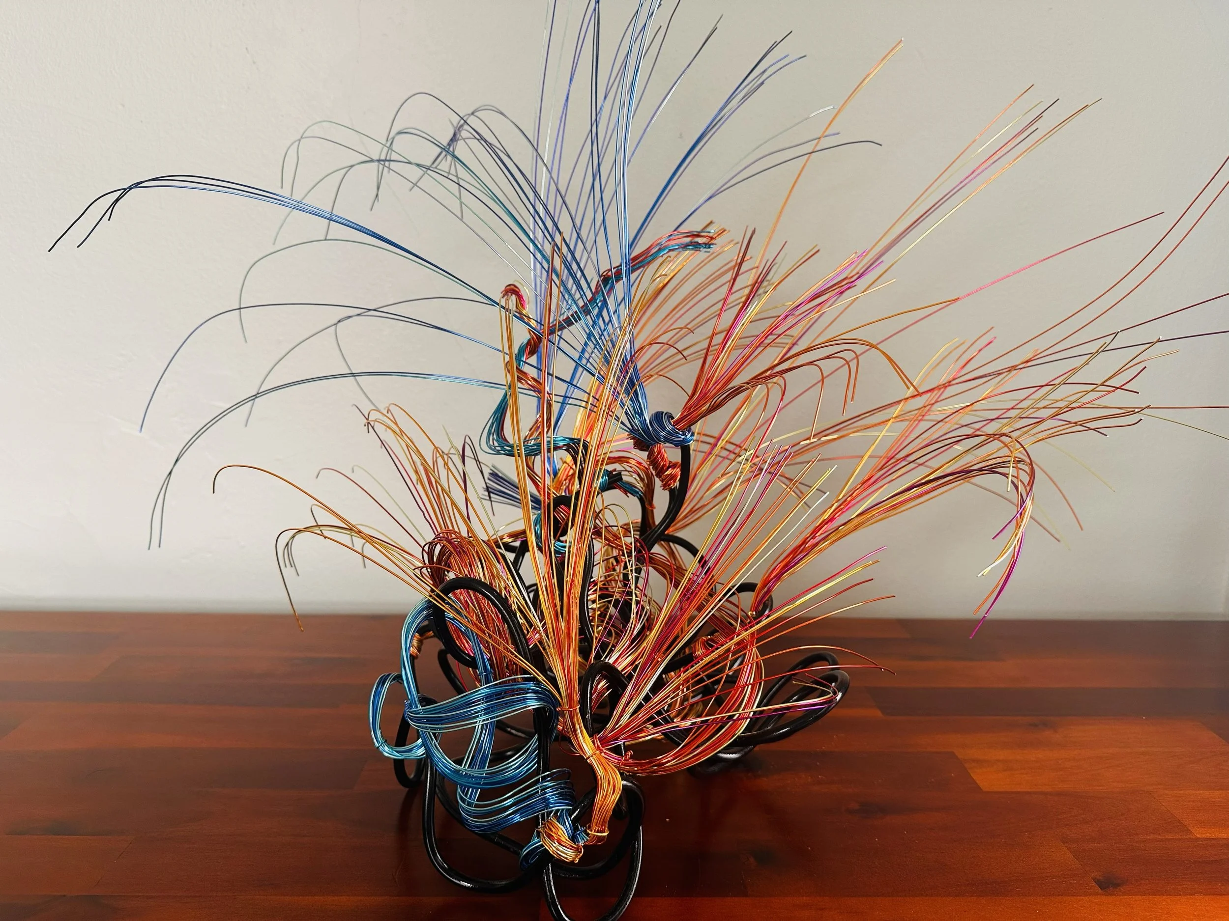 Title: "Releasing" View from front.
Dimensions: 2' 4" × 1' 4" × 2' 0"
The sculpture tilts gently, as though responding to a subtle pull of light or wind. A quiet, directional piece that feels aware of its surroundings.
