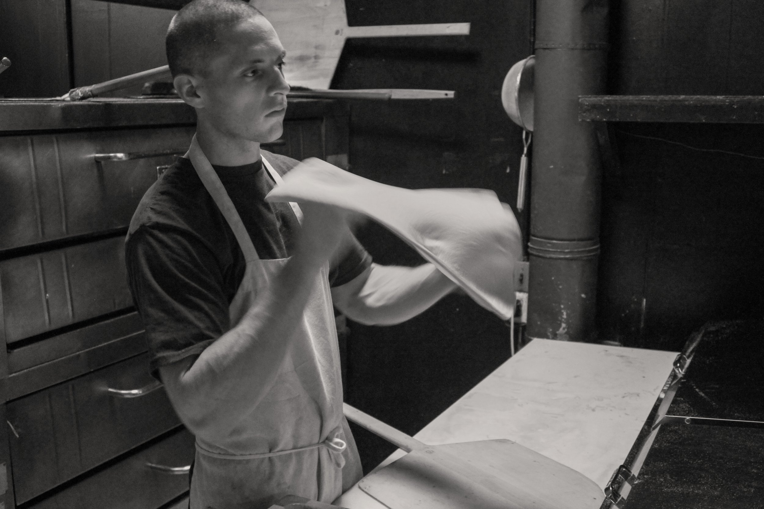 Man preparing pizza dough