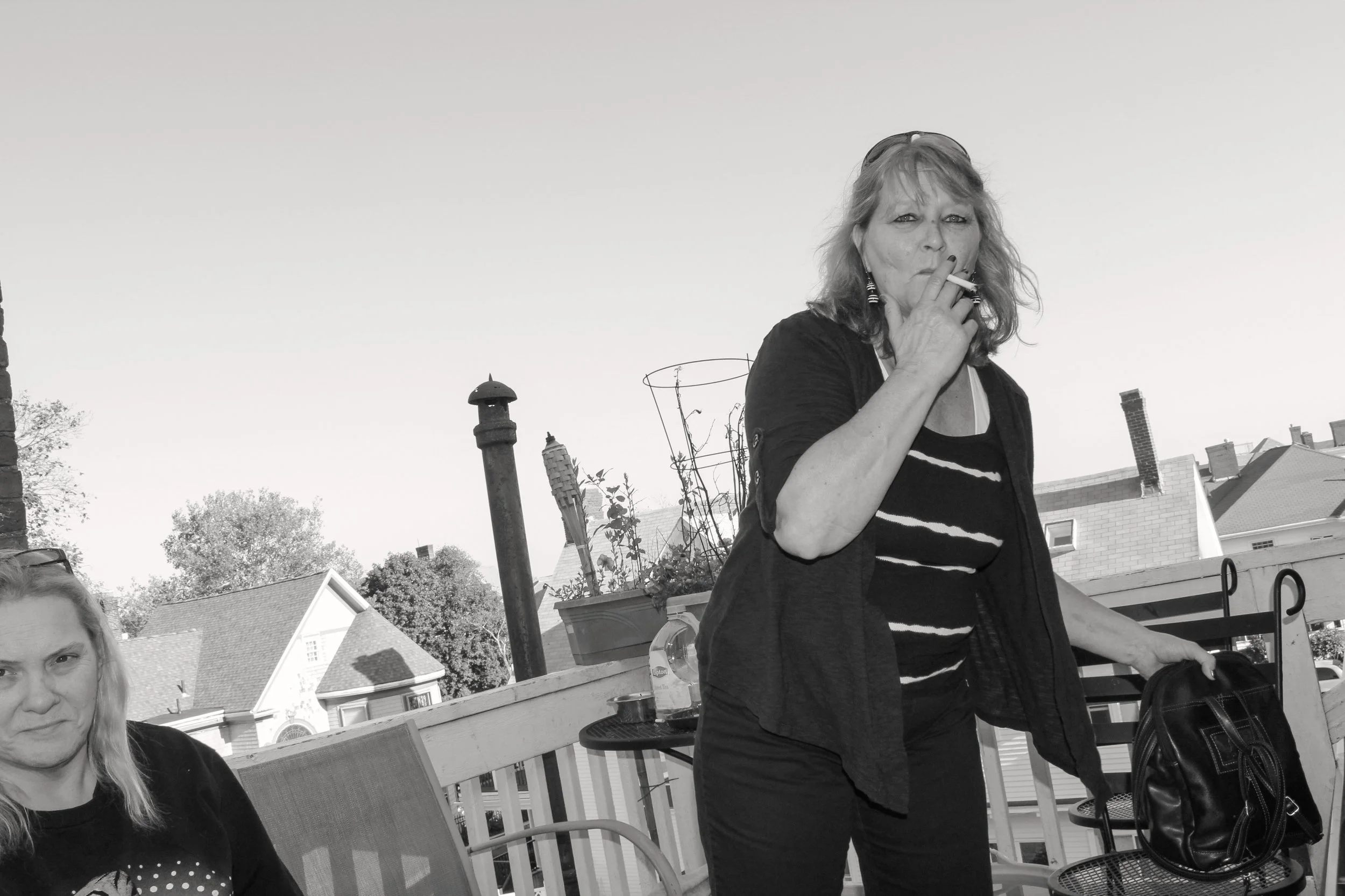Woman smokes cigarette
