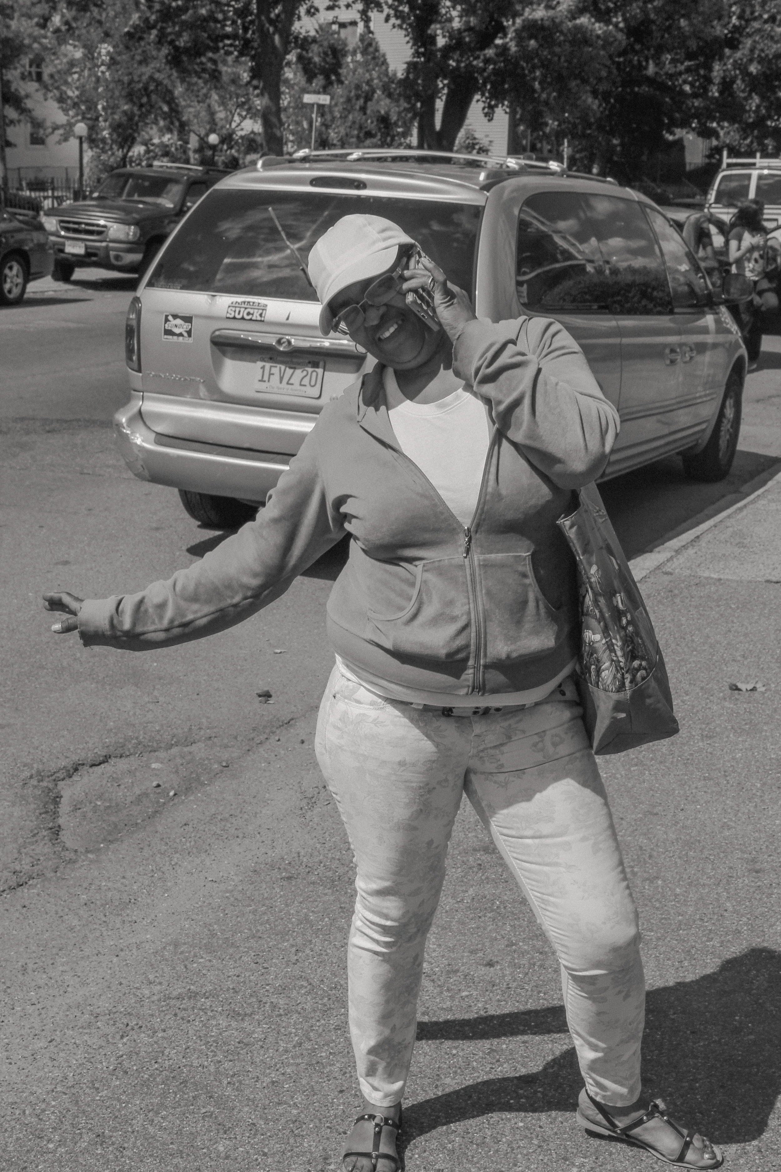 Woman poses while on a call