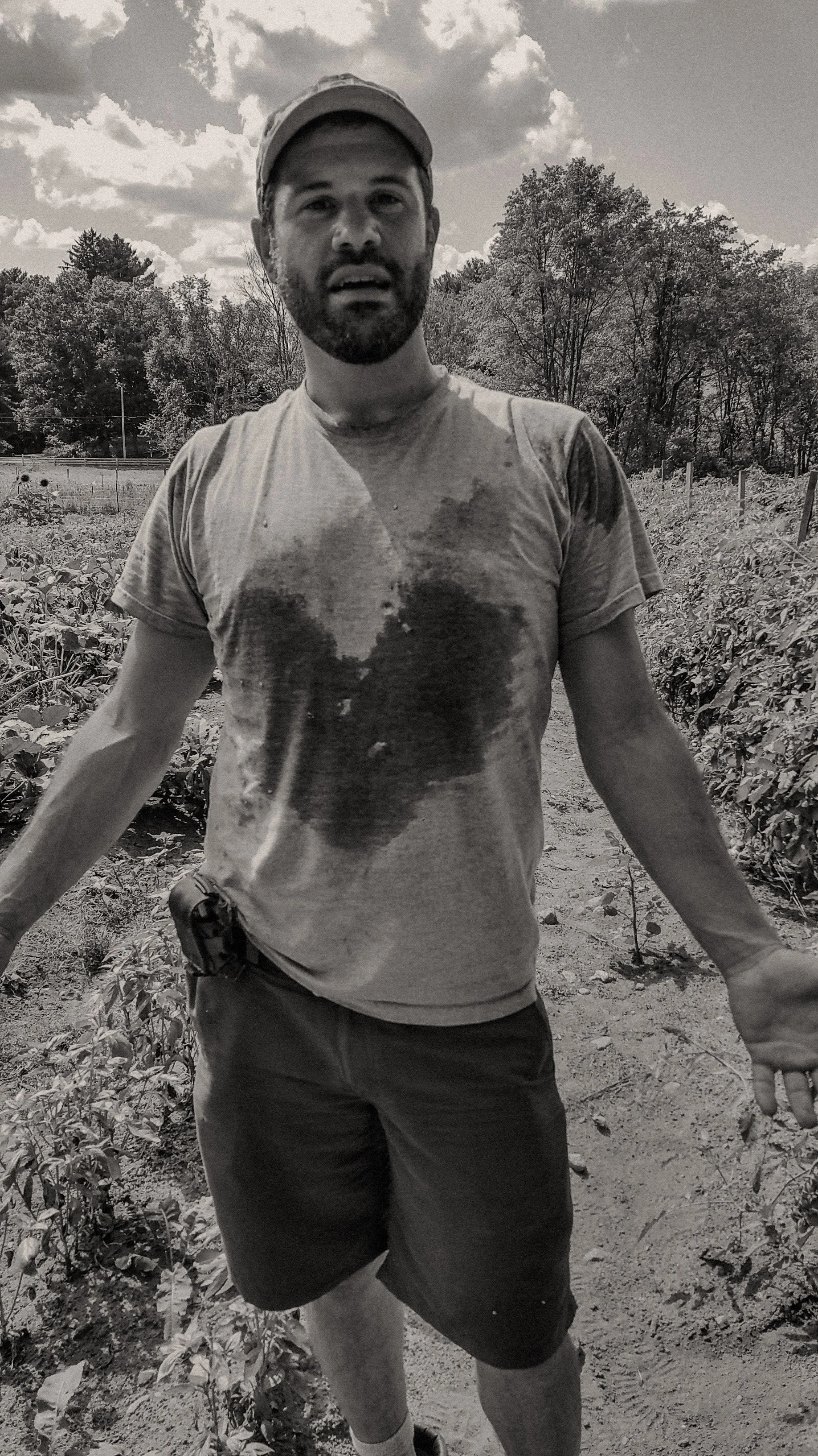 Farmer sweats a heart onto shirt