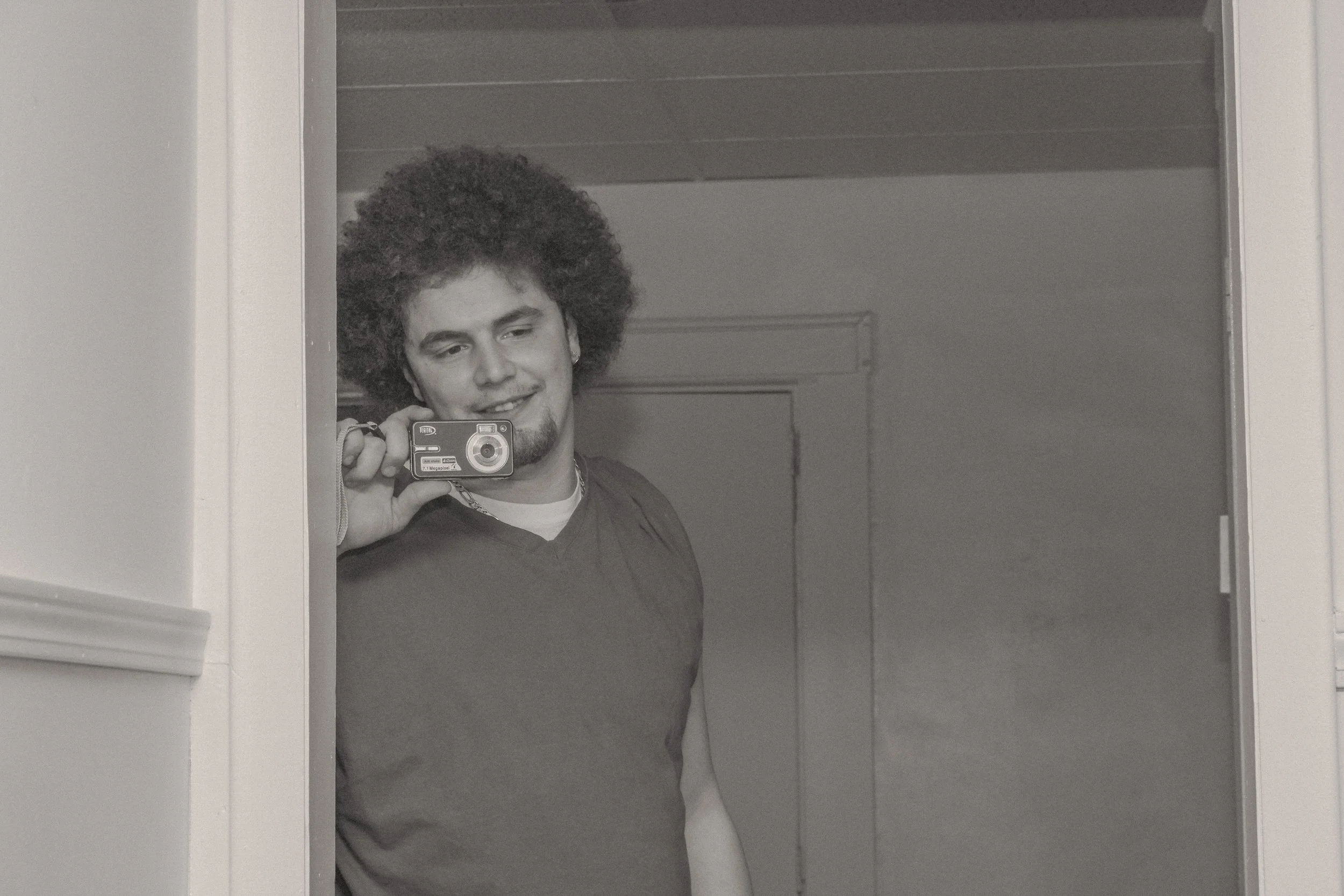 Dad photographing his son, joy