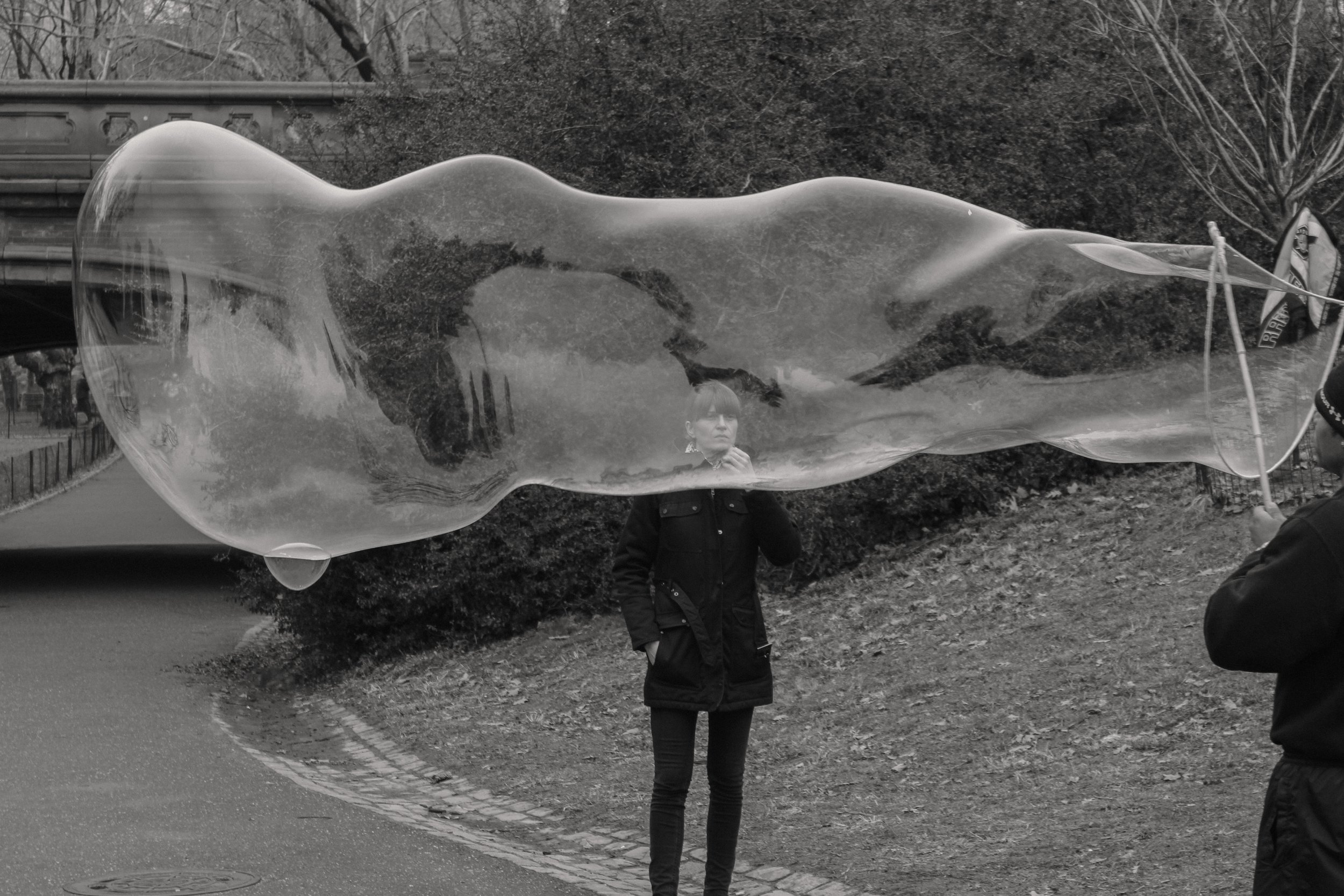 2013 Woman observes bubble by artist