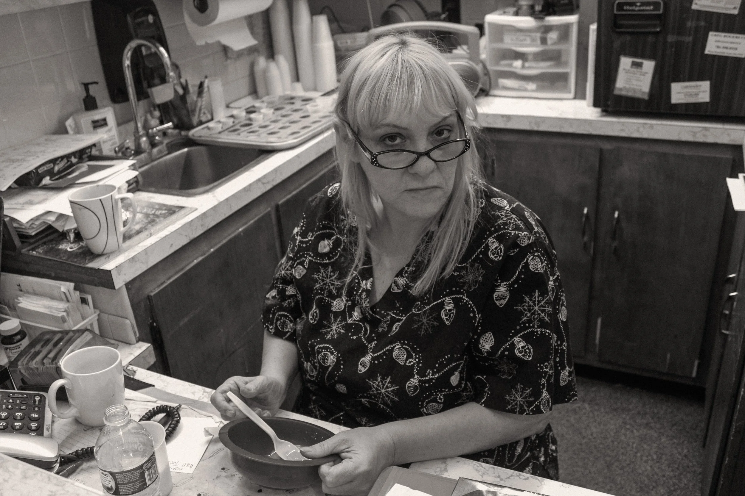 Woman finishing something in a bowl