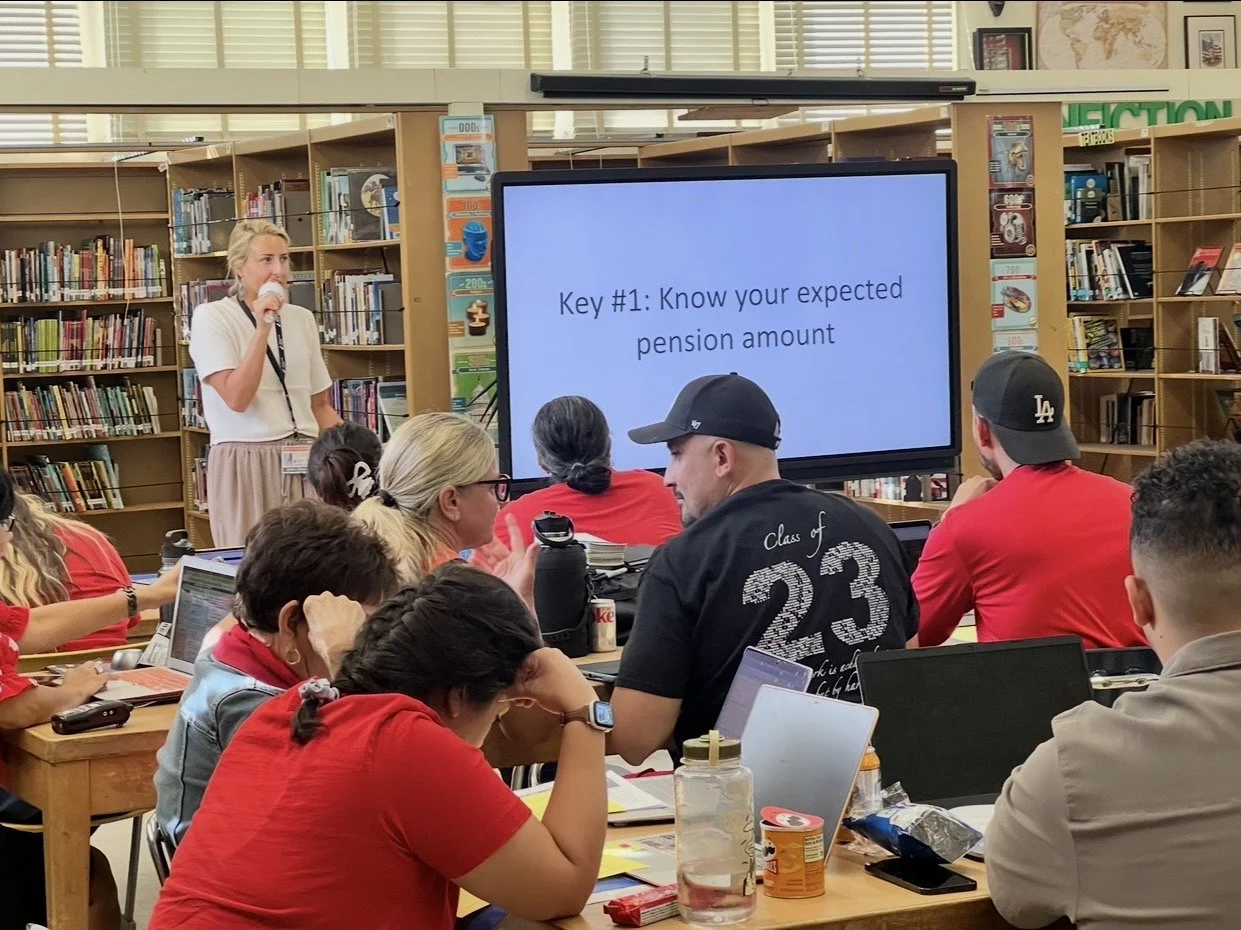 A woman giving a presentation in a library classroom, with a large screen displaying "Key #1: Know your expected pension amount". Several students sit at tables taking notes or using laptops.