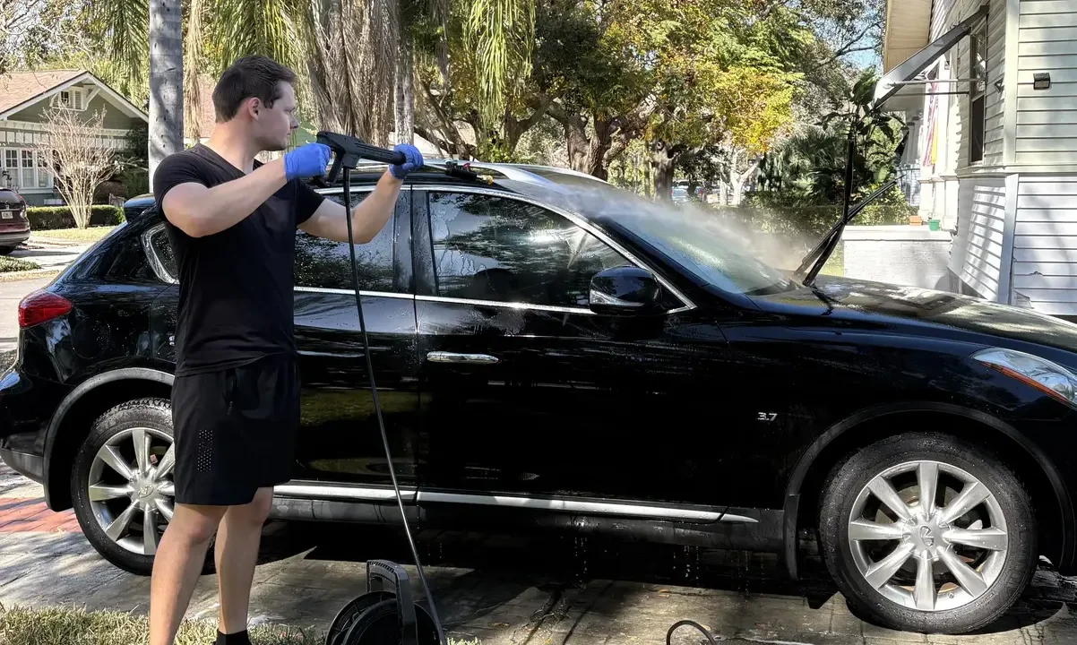Victor detailing a car